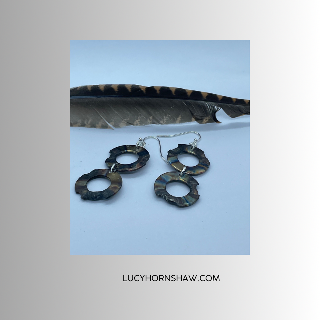 2 ring annealed steel drop earrings.