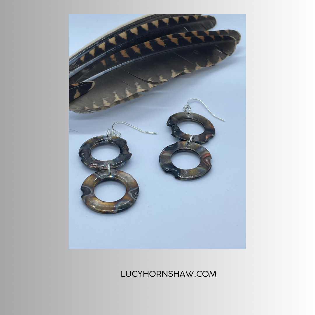 2 ring annealed steel drop earrings, with resin.