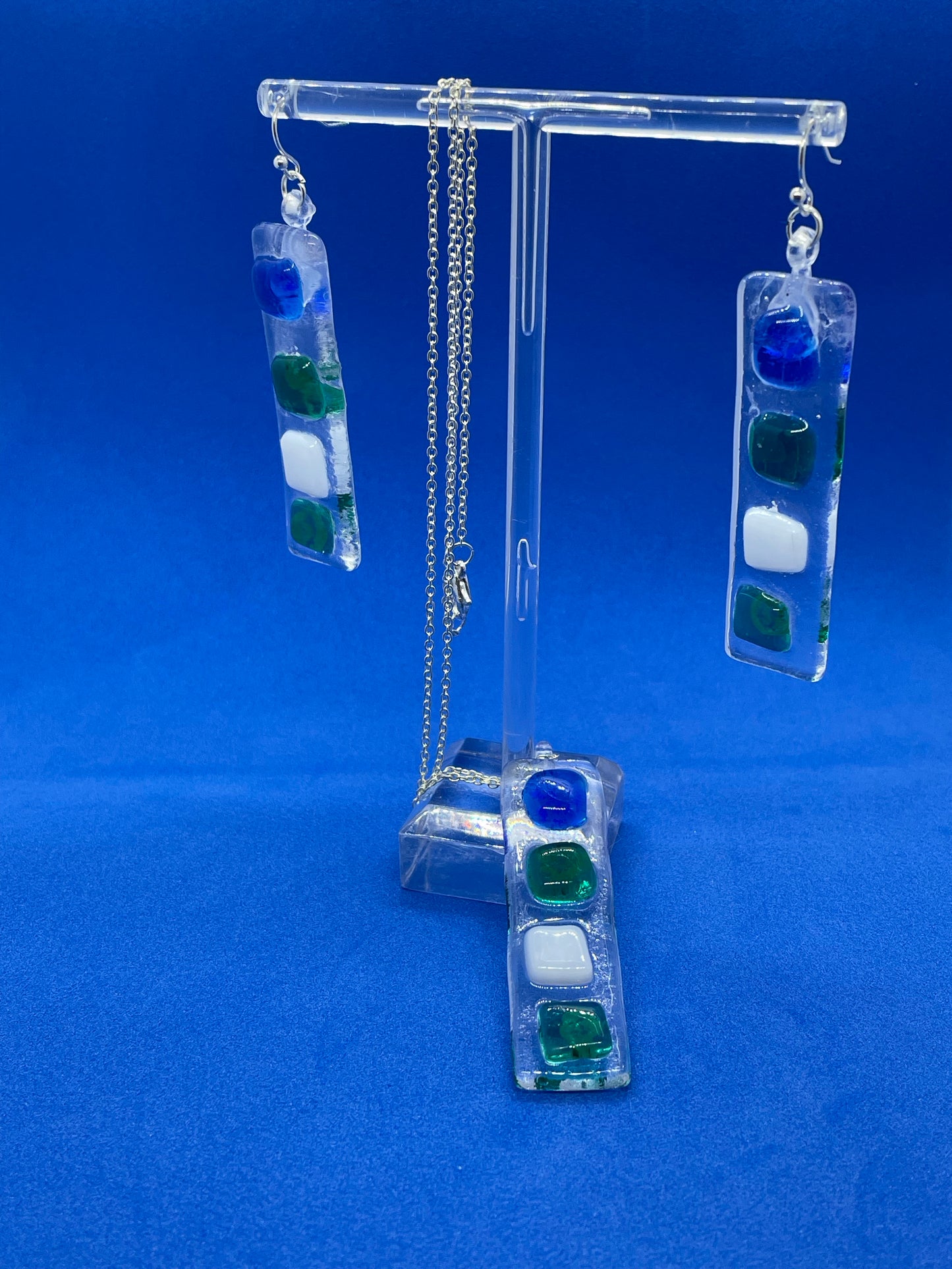Fused clear glass with blue, green, and white squares oblong earrings