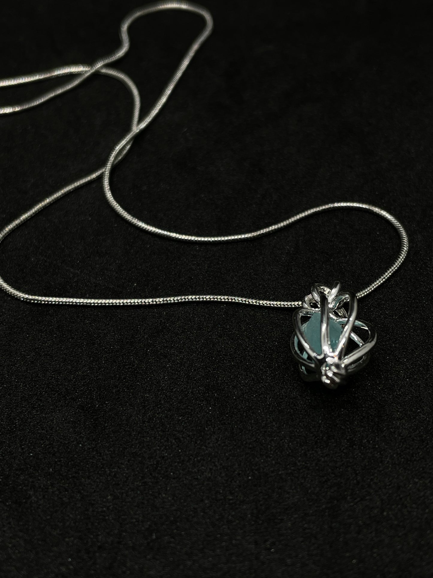 Turquoise Seaglass in silver cage necklace