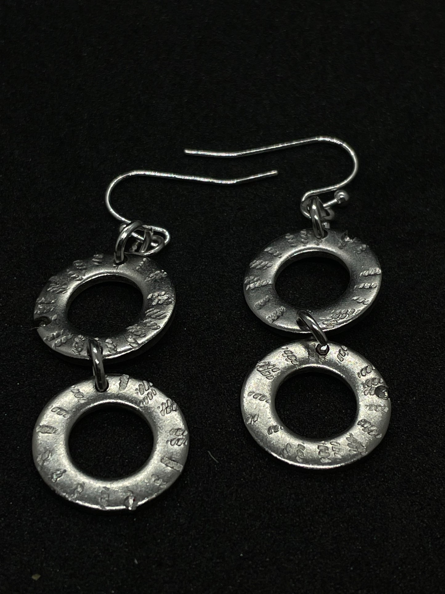 2 ring drop steel earrings.