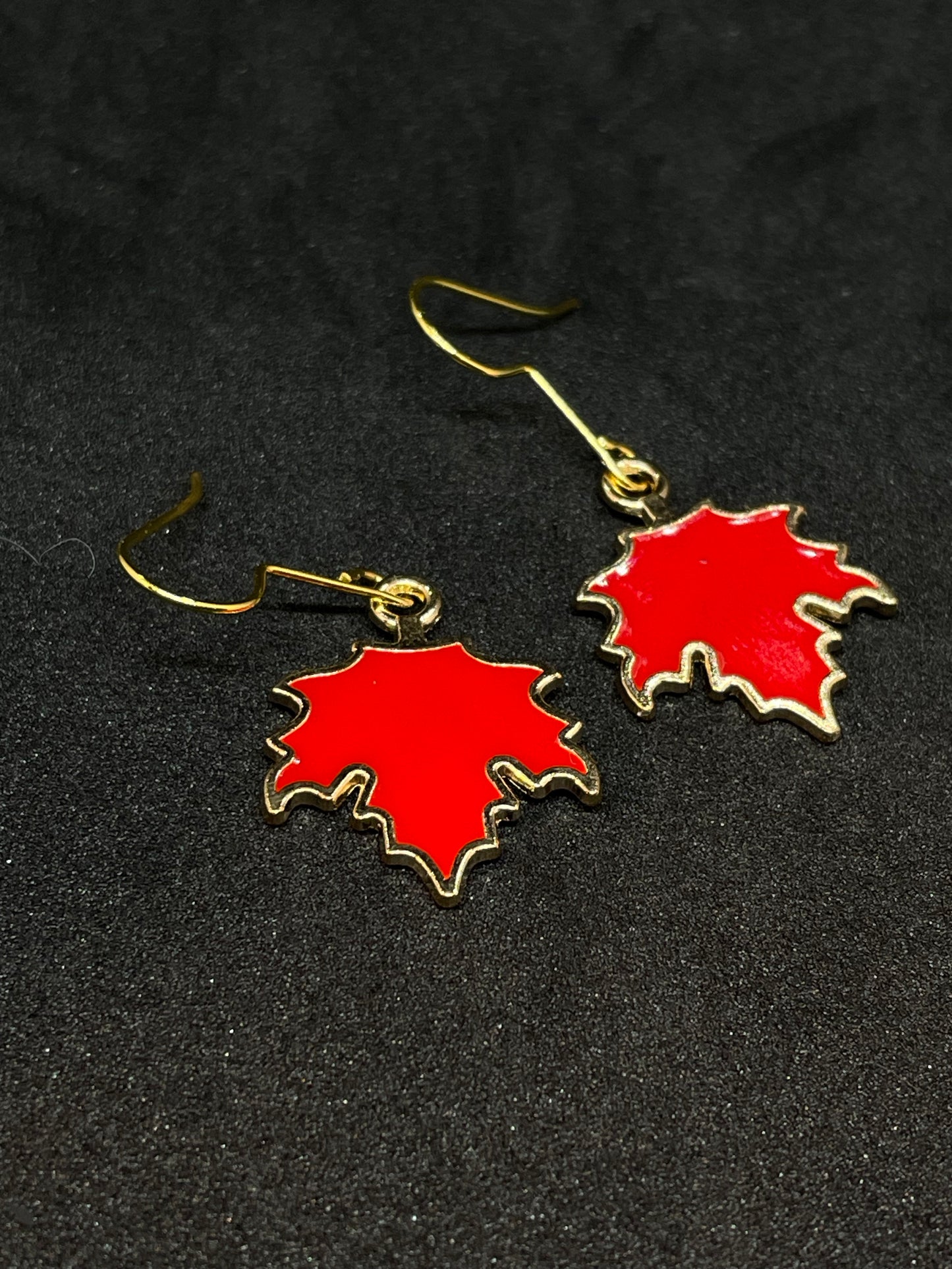 Maple leaf charm drop earrings with gold hooks