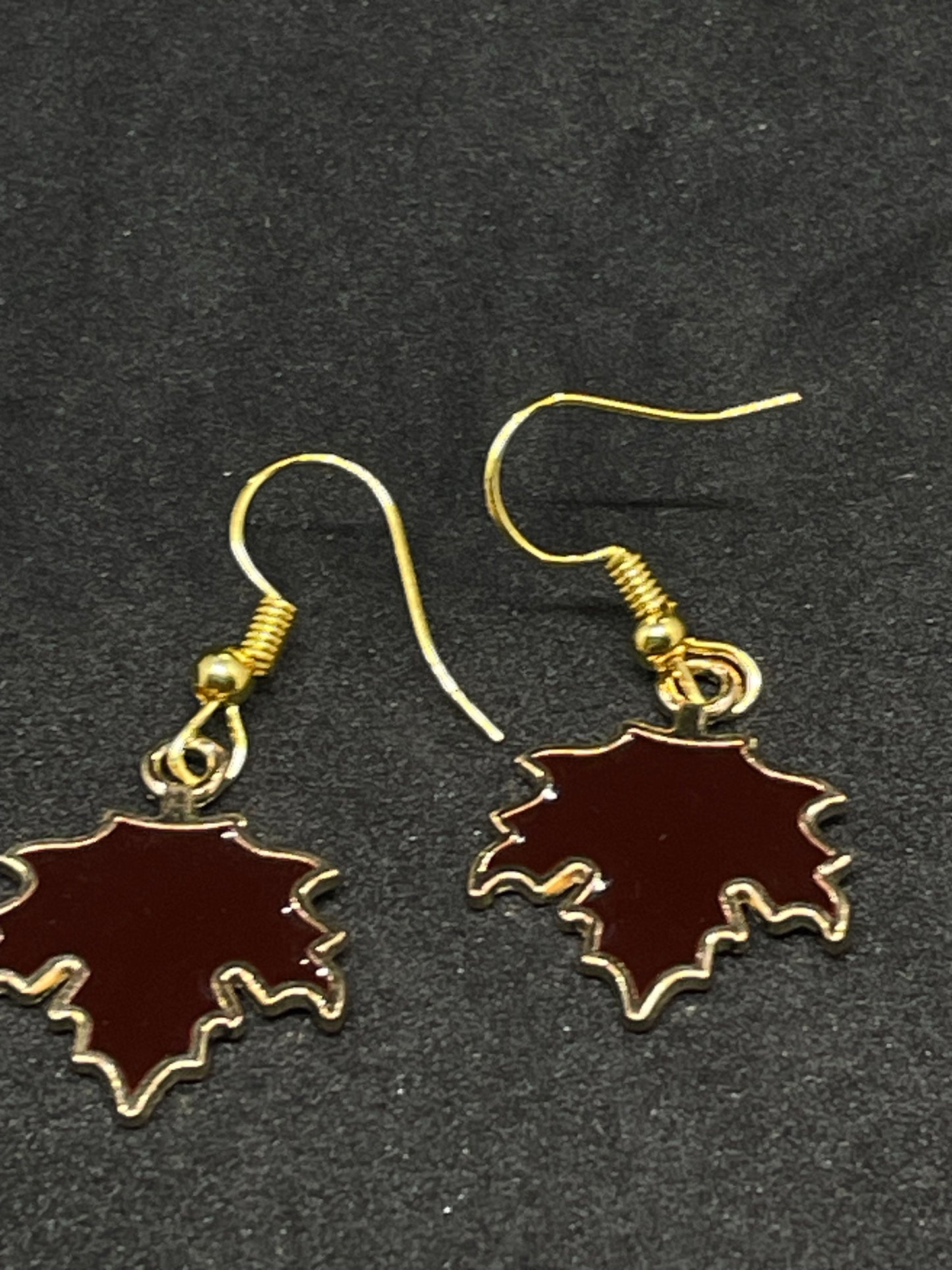 Maple leaf charm drop earrings with gold hooks