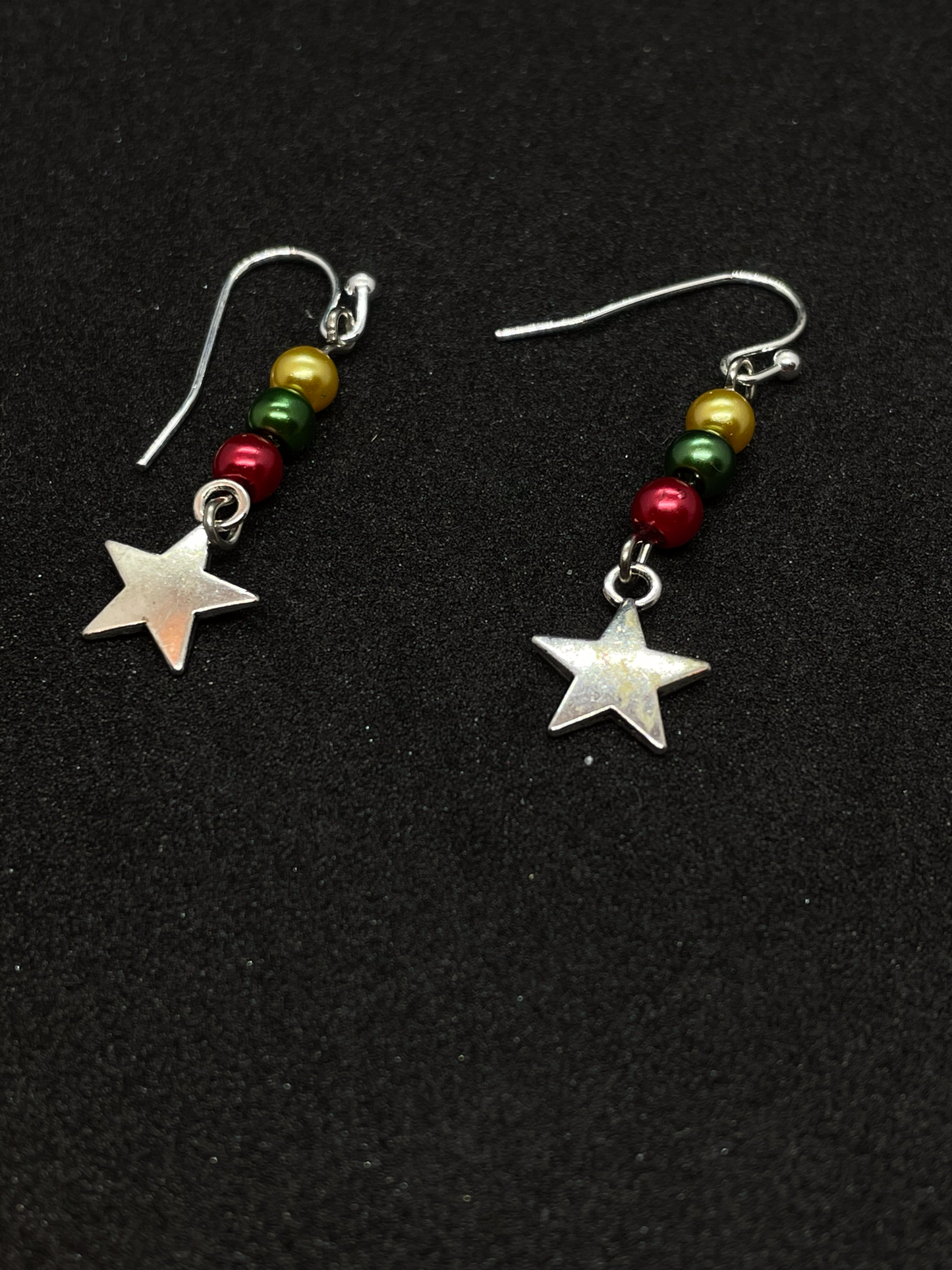 Festive drop earrings with beads and stars