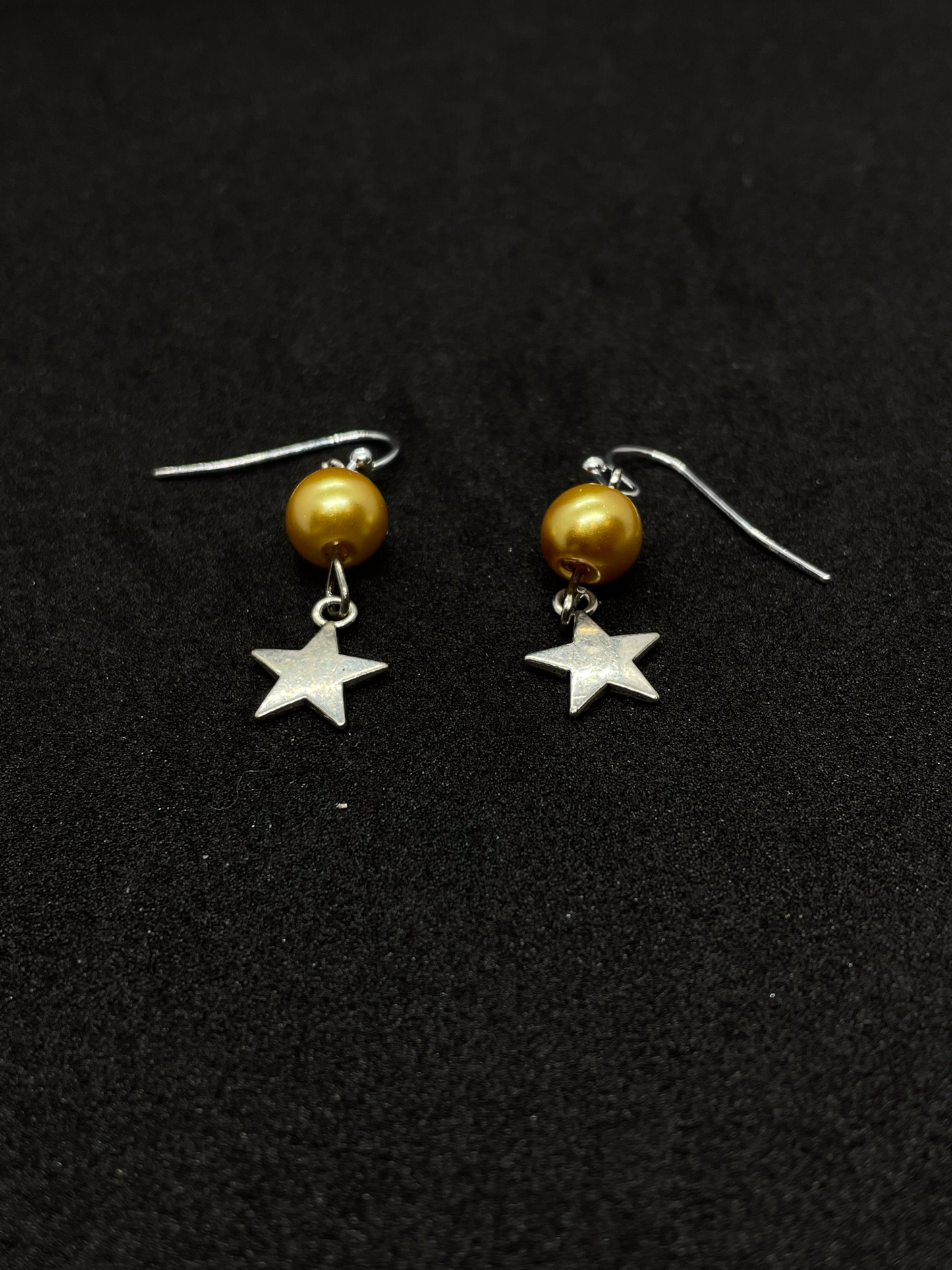 Festive drop earrings with beads and stars