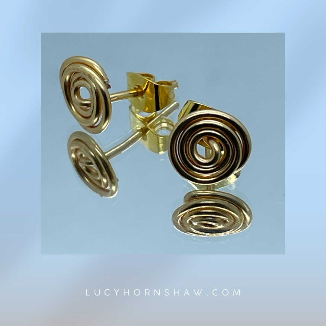 Silver wire coil stud earrings
