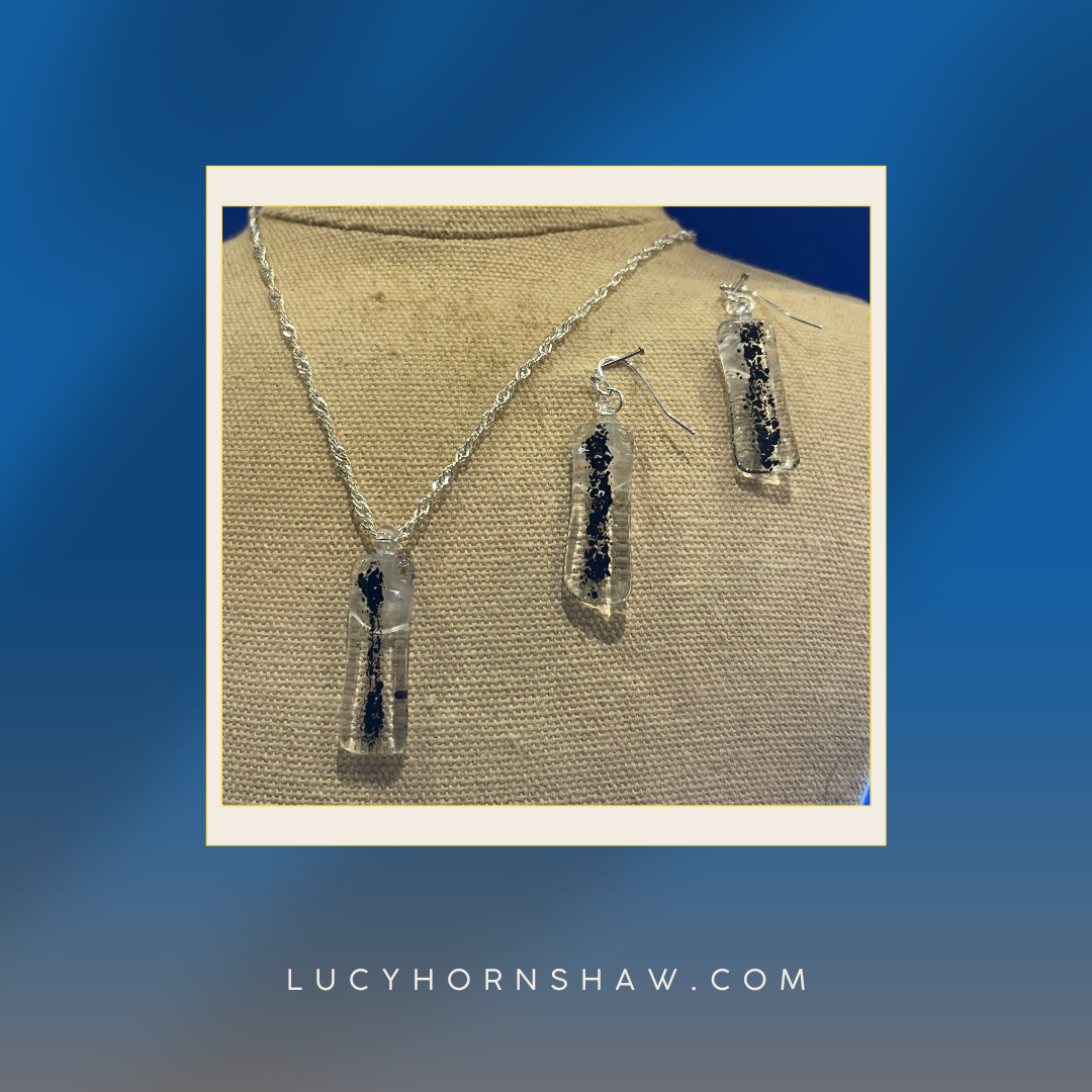 Fused clear and black glass oblong necklace