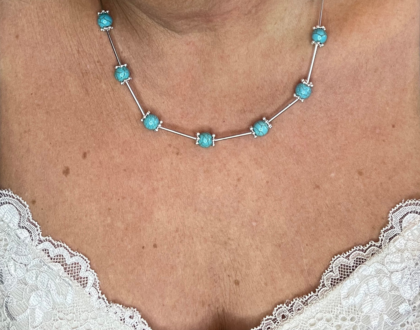 Wire & turquoise bead bracelet with silver rod spacers
