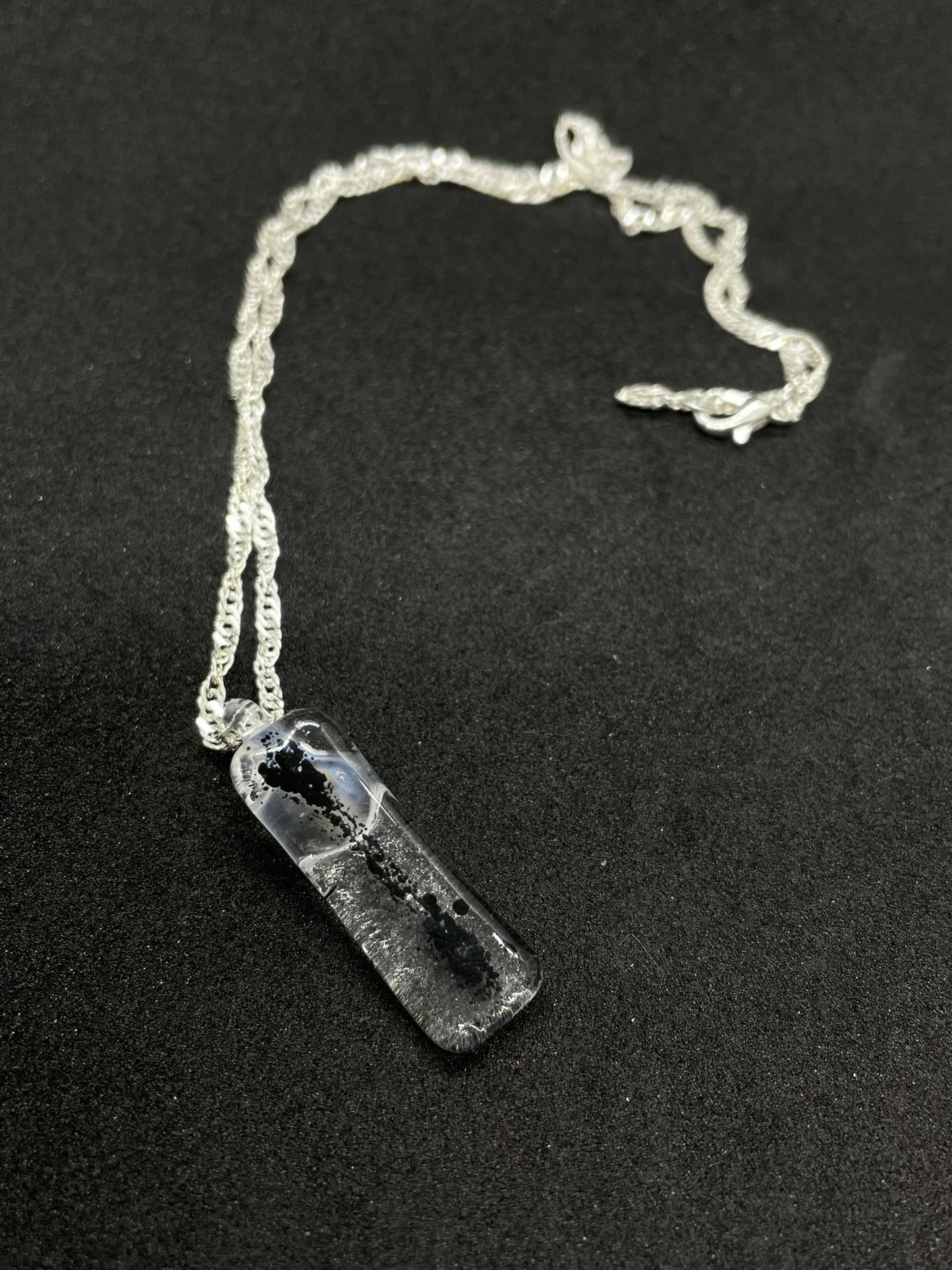 Fused clear and black glass oblong necklace