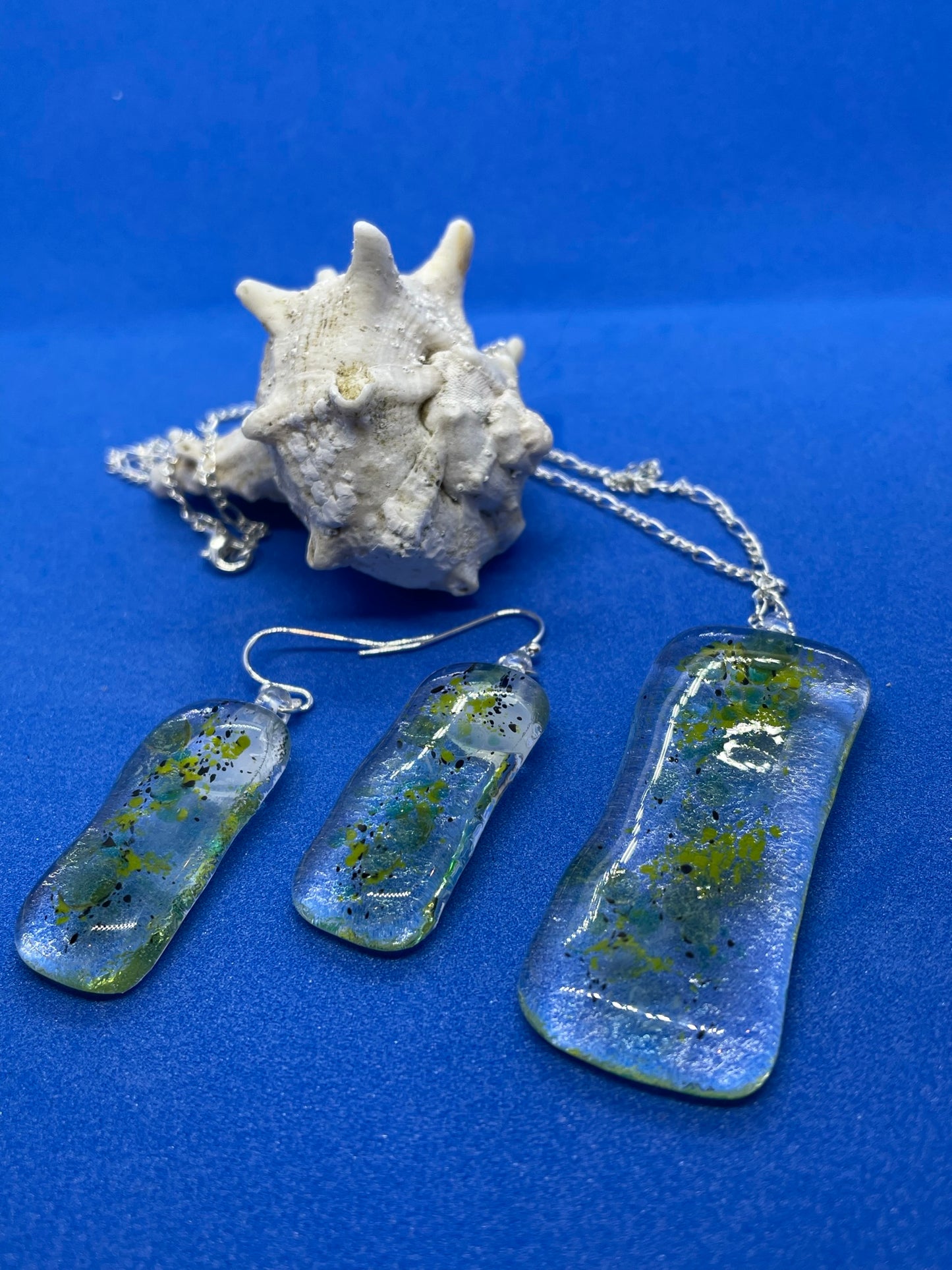 Fused clear and green glass oblong earrings