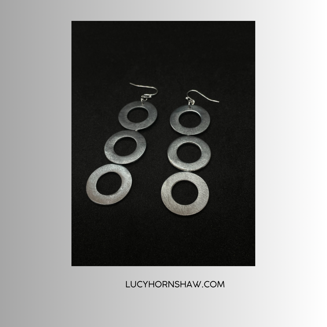 3 steel rings earrings