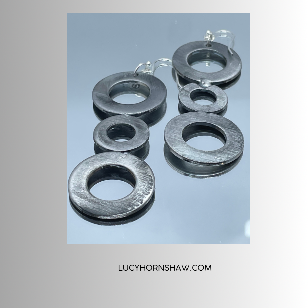 3 steel rings drop earrings
