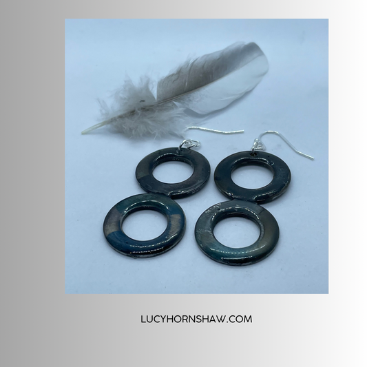 2 steel rings, with resin drop earrings.
