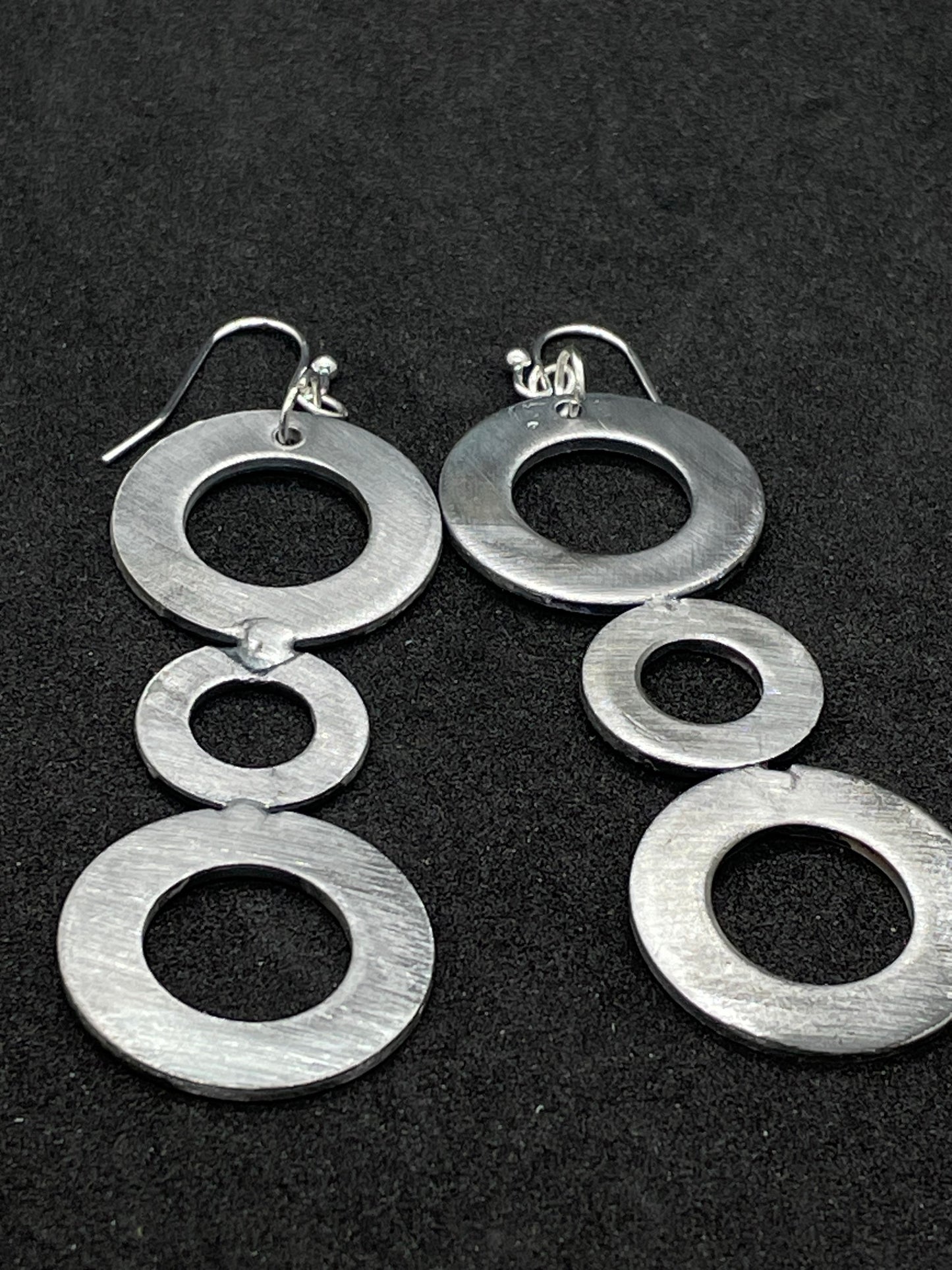 3 steel rings drop earrings