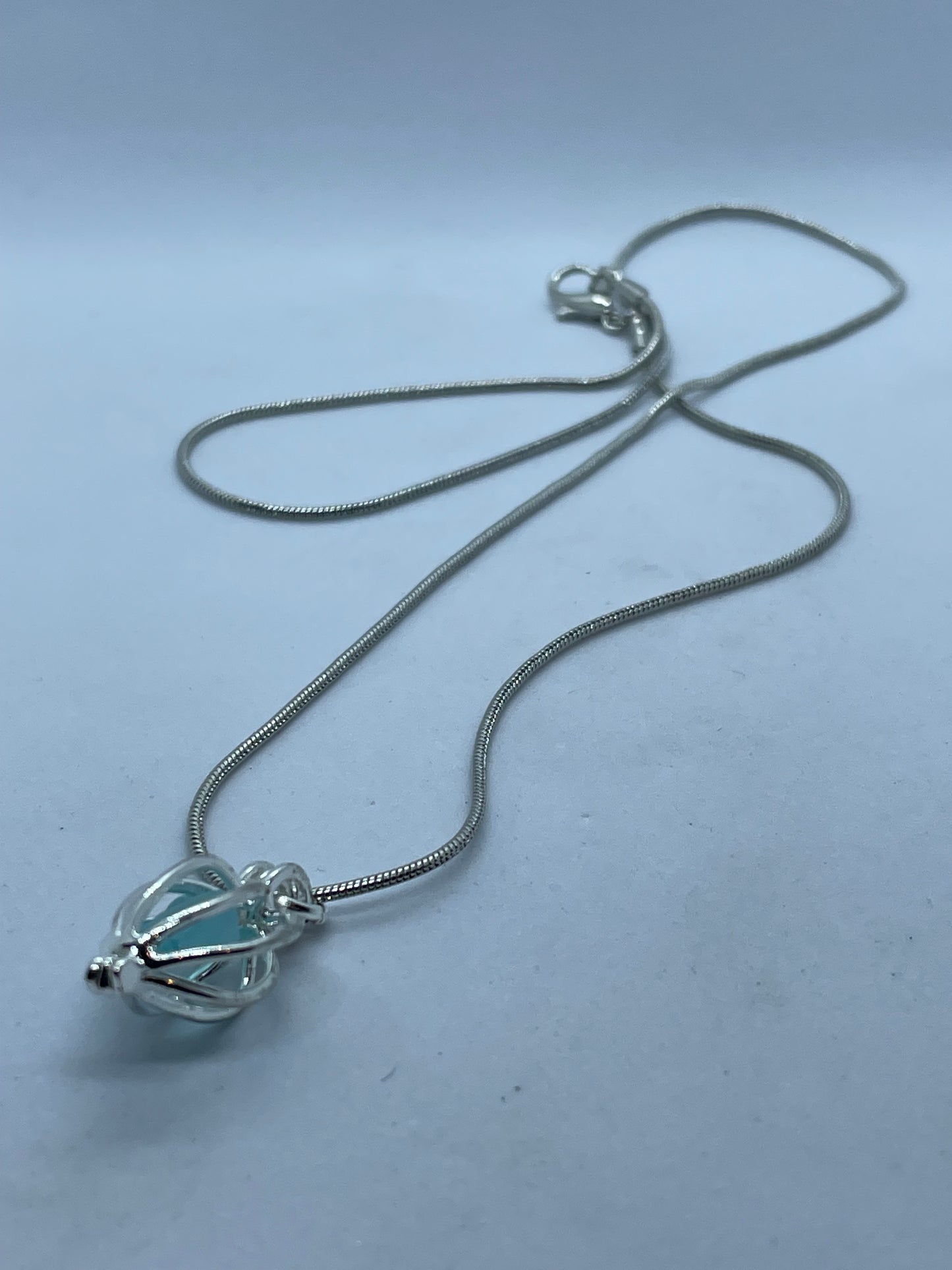 Turquoise Seaglass in silver cage necklace