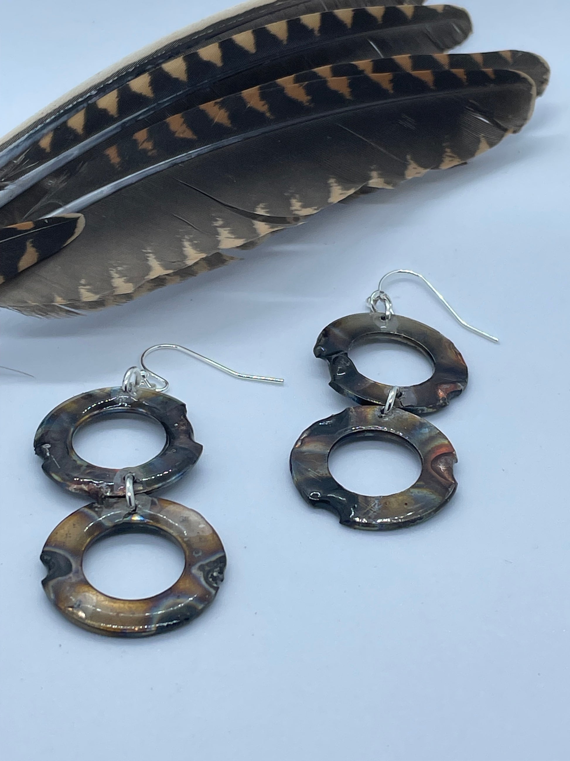 2 ring annealed steel drop earrings, with resin.