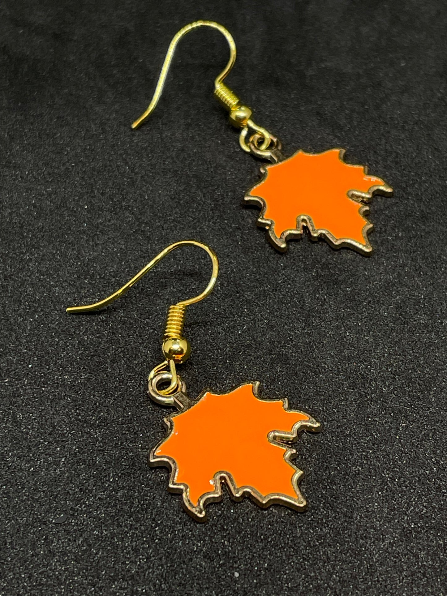 Maple leaf charm drop earrings with gold hooks