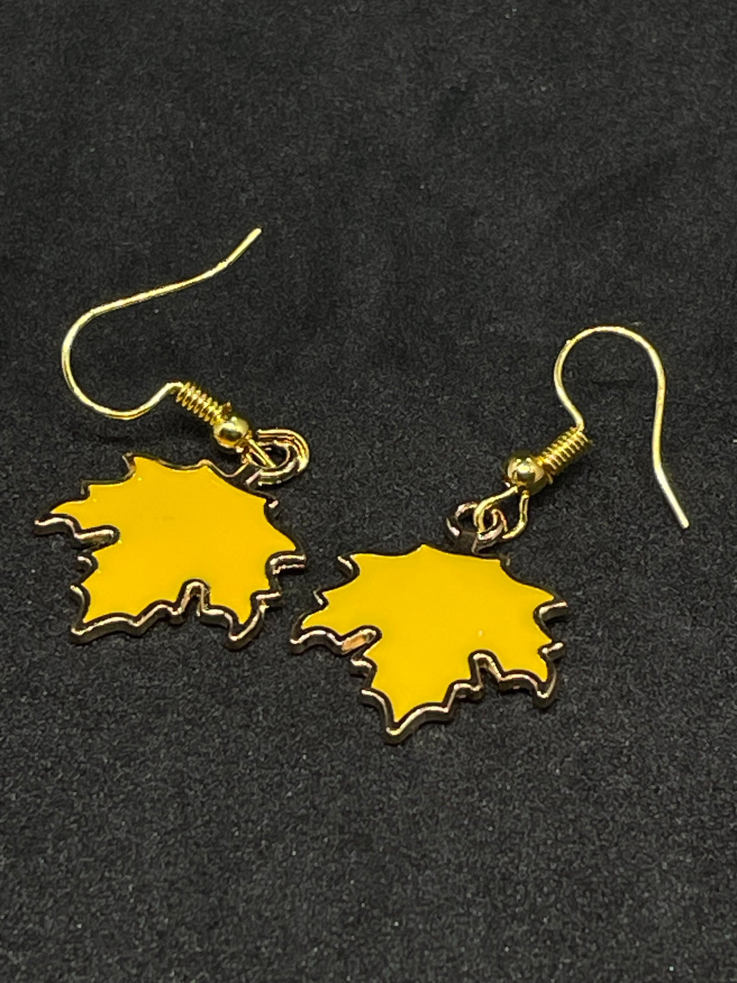 Maple leaf charm drop earrings with gold hooks