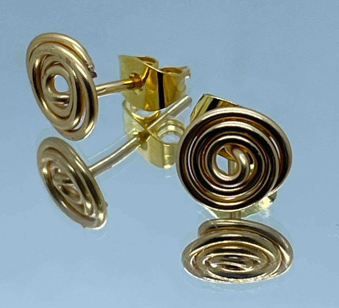 Silver wire coil stud earrings