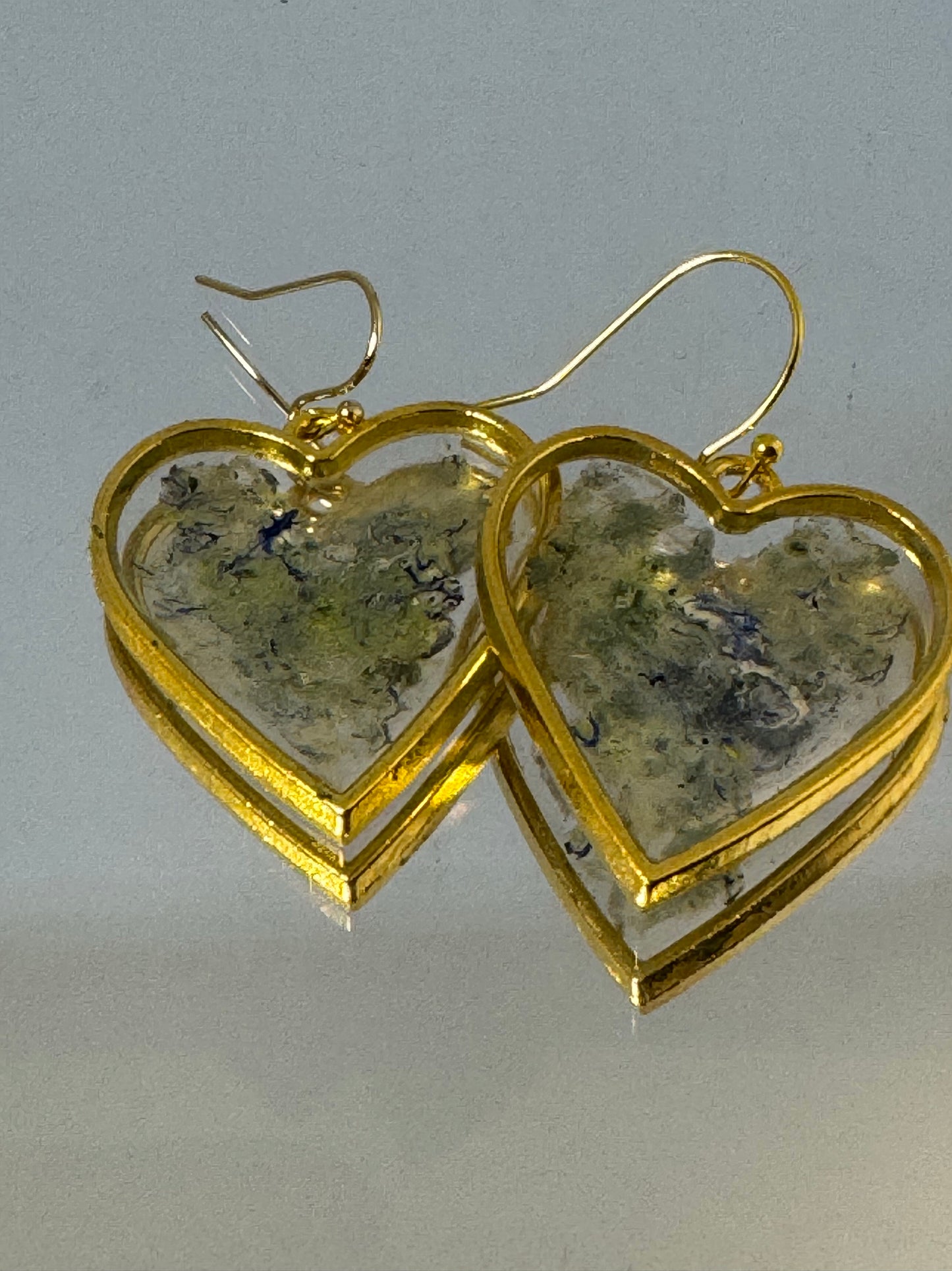 Green and clear heart drop earrings