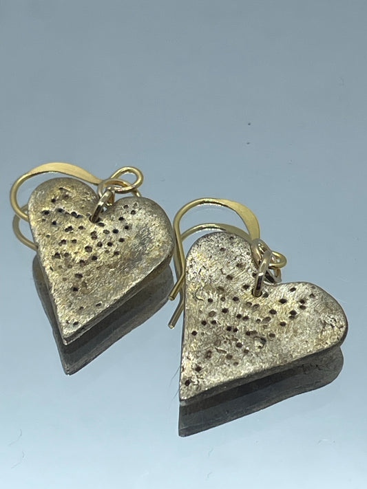 Bronze heart earrings with pin prick lines