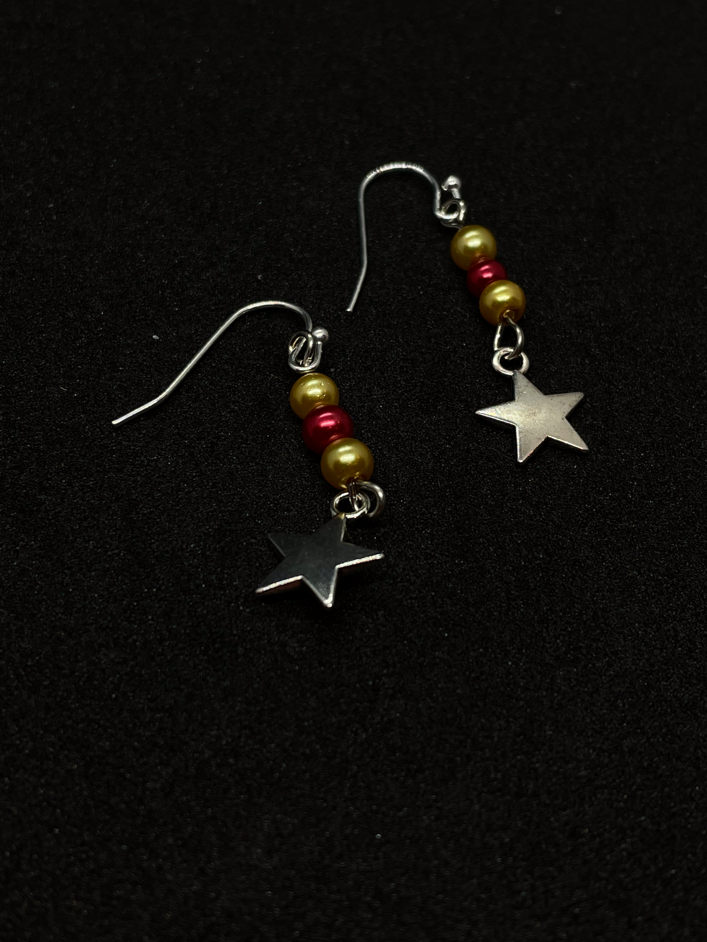 Festive drop earrings with beads and stars