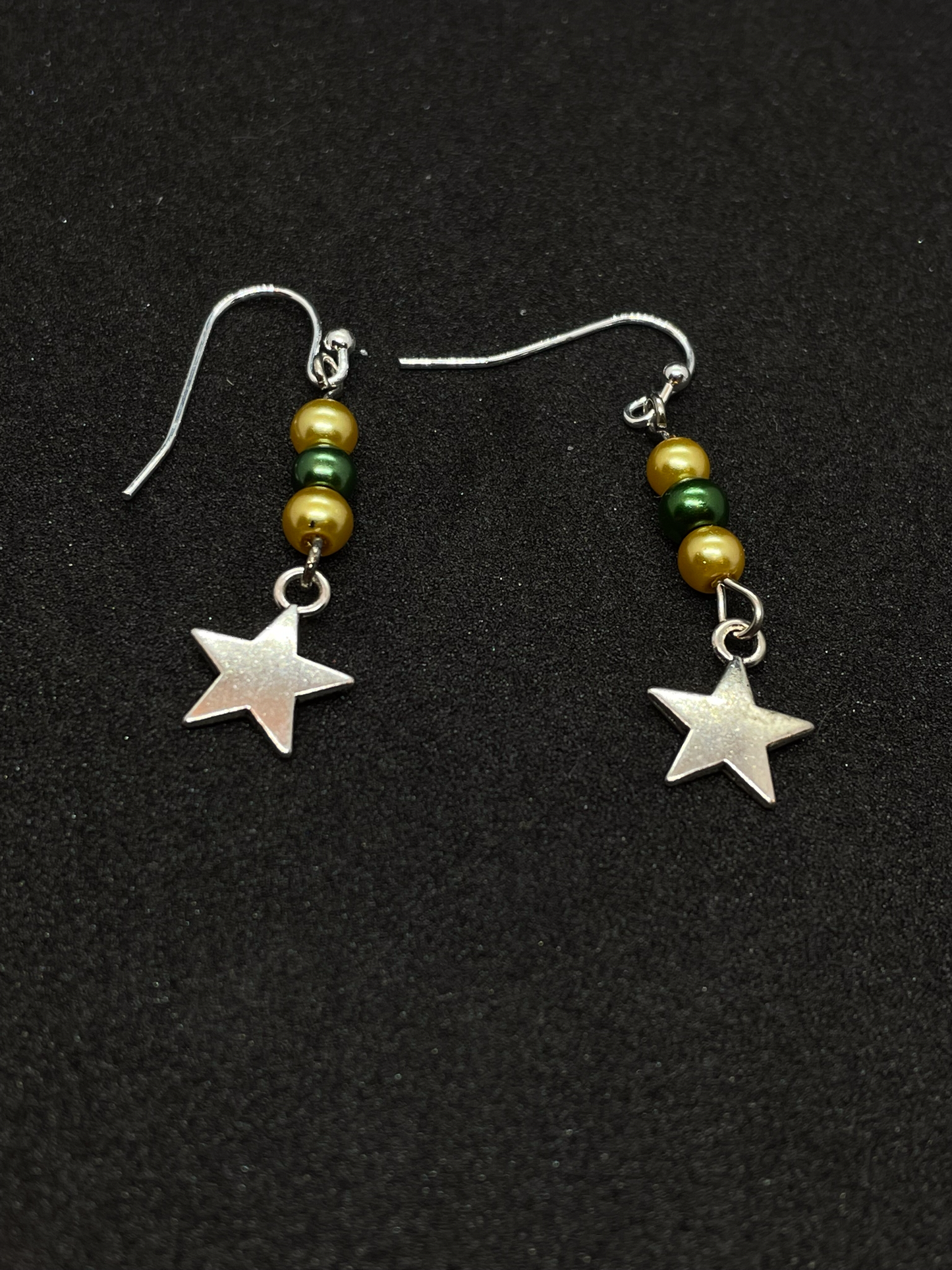 Festive drop earrings with beads and stars