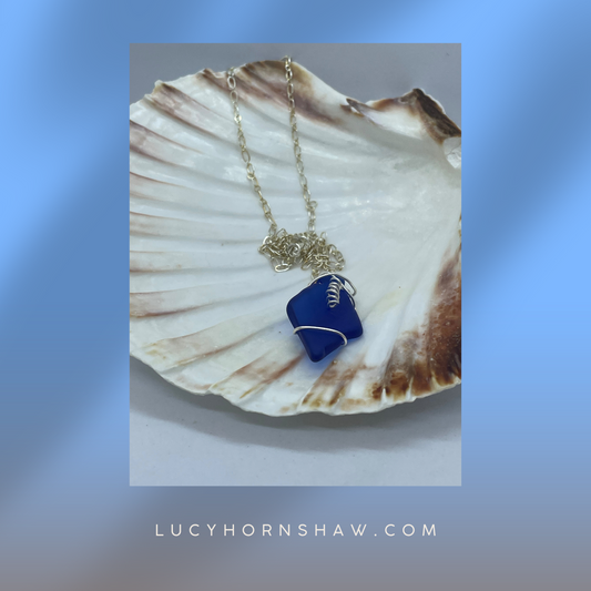 Blue seaglass and silver wire wrap necklace