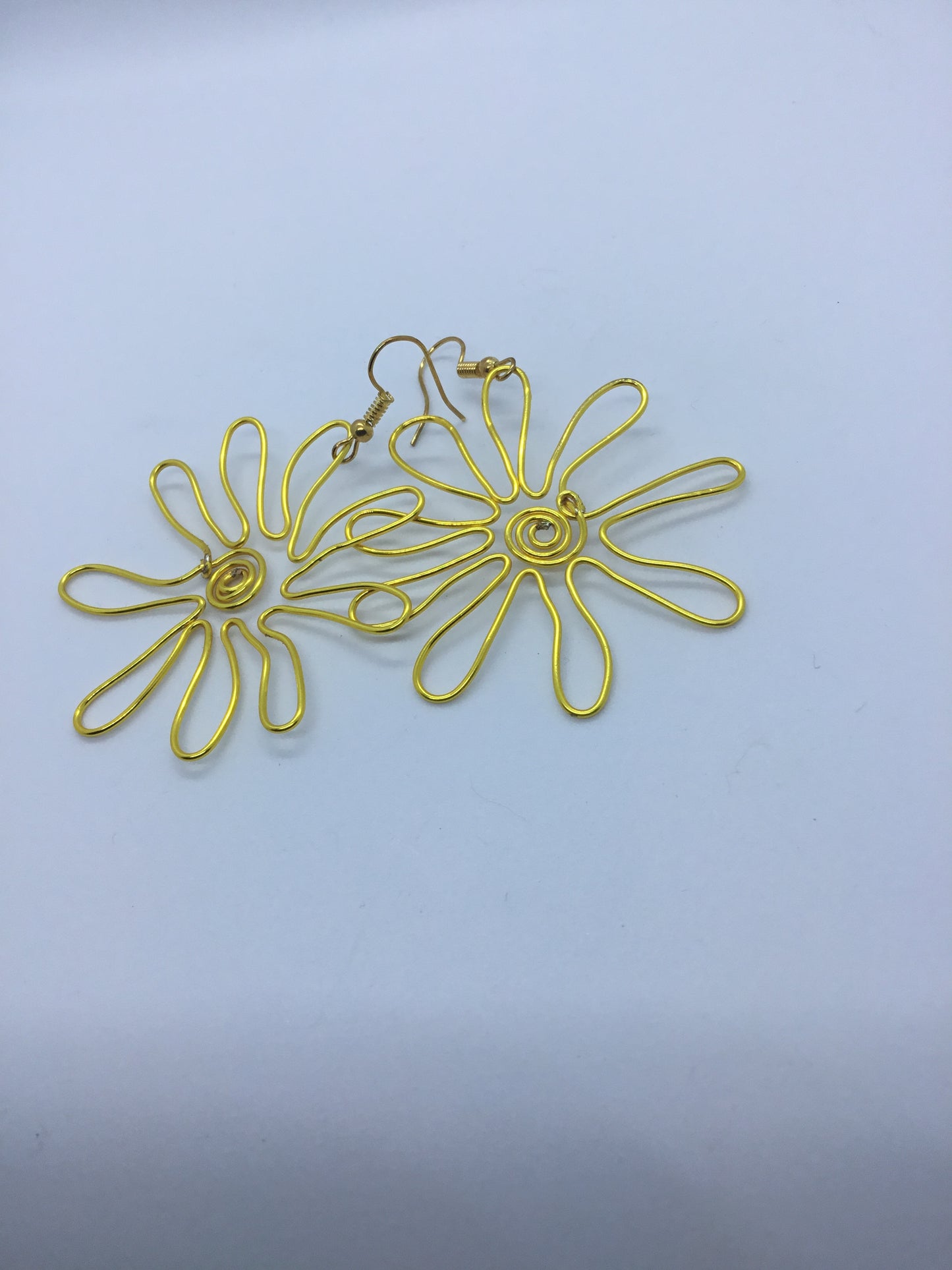 Wire flower earrings in gold wire