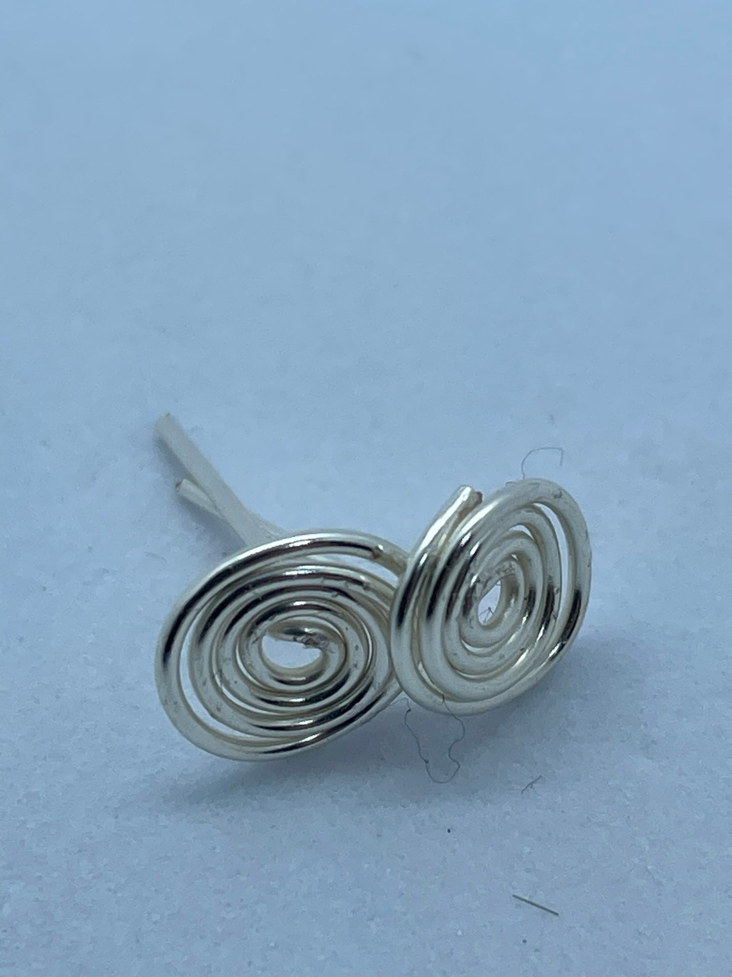 Silver wire coil stud earrings