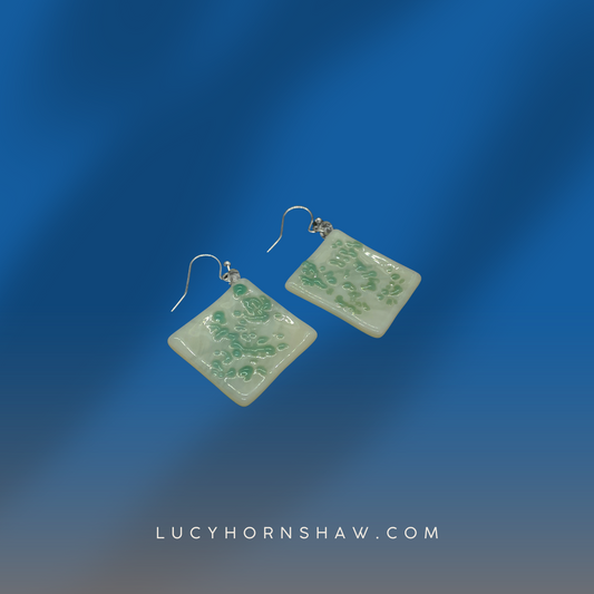 White and green rhombus fused glass earrings. 