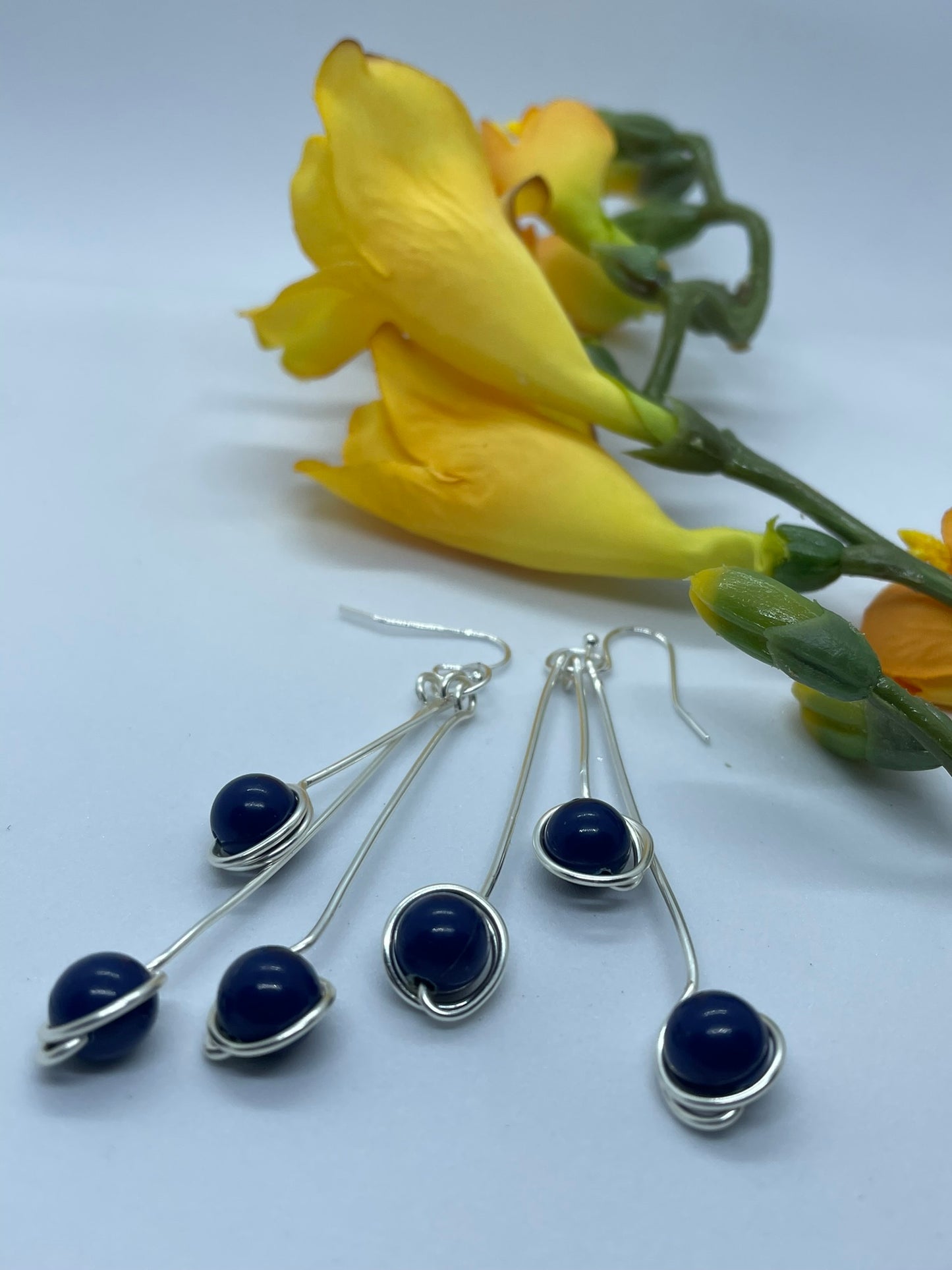 Wire & 3 blue bead earrings in silver wire