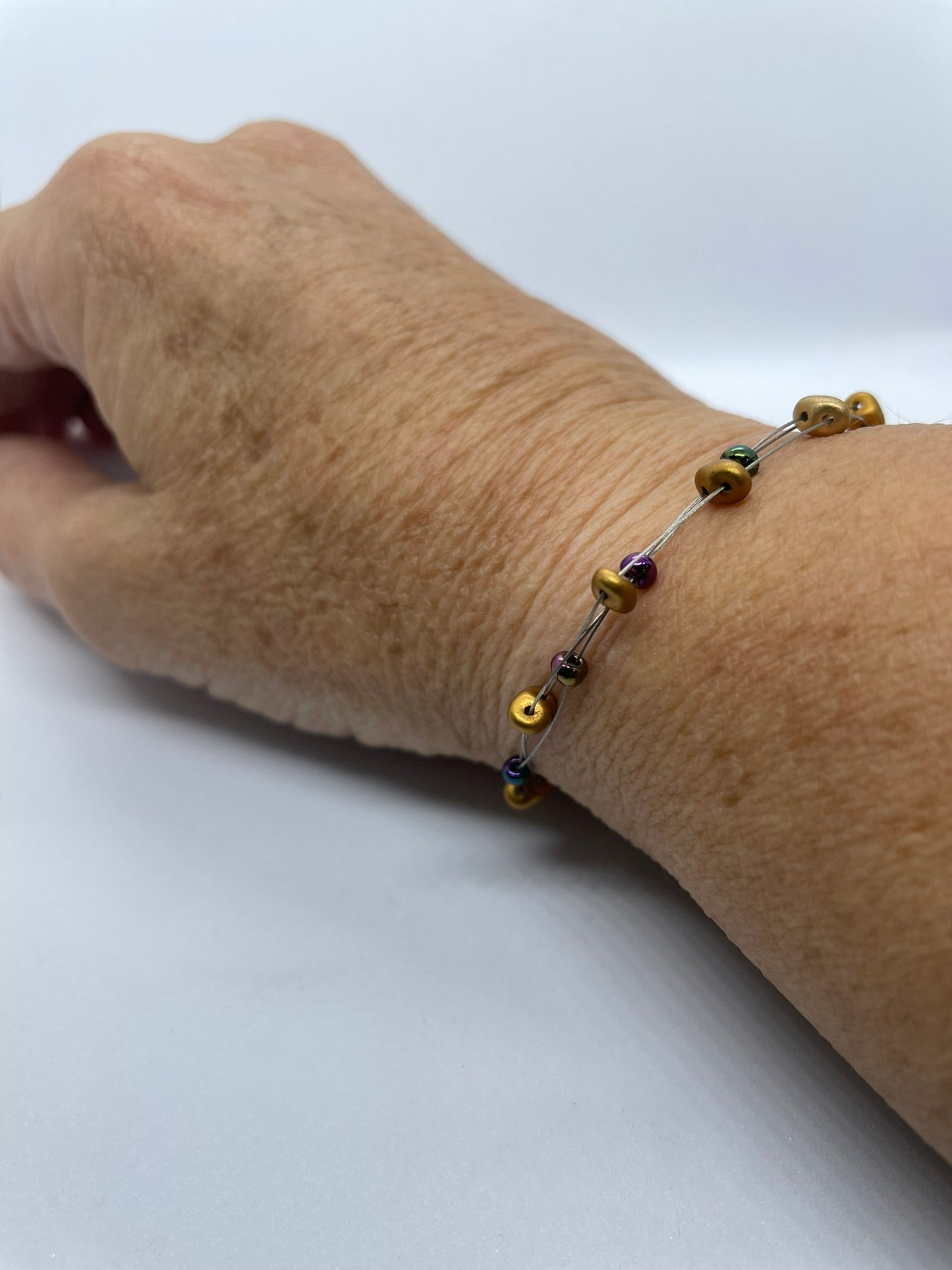 Wire with bronze seed bead bracelet