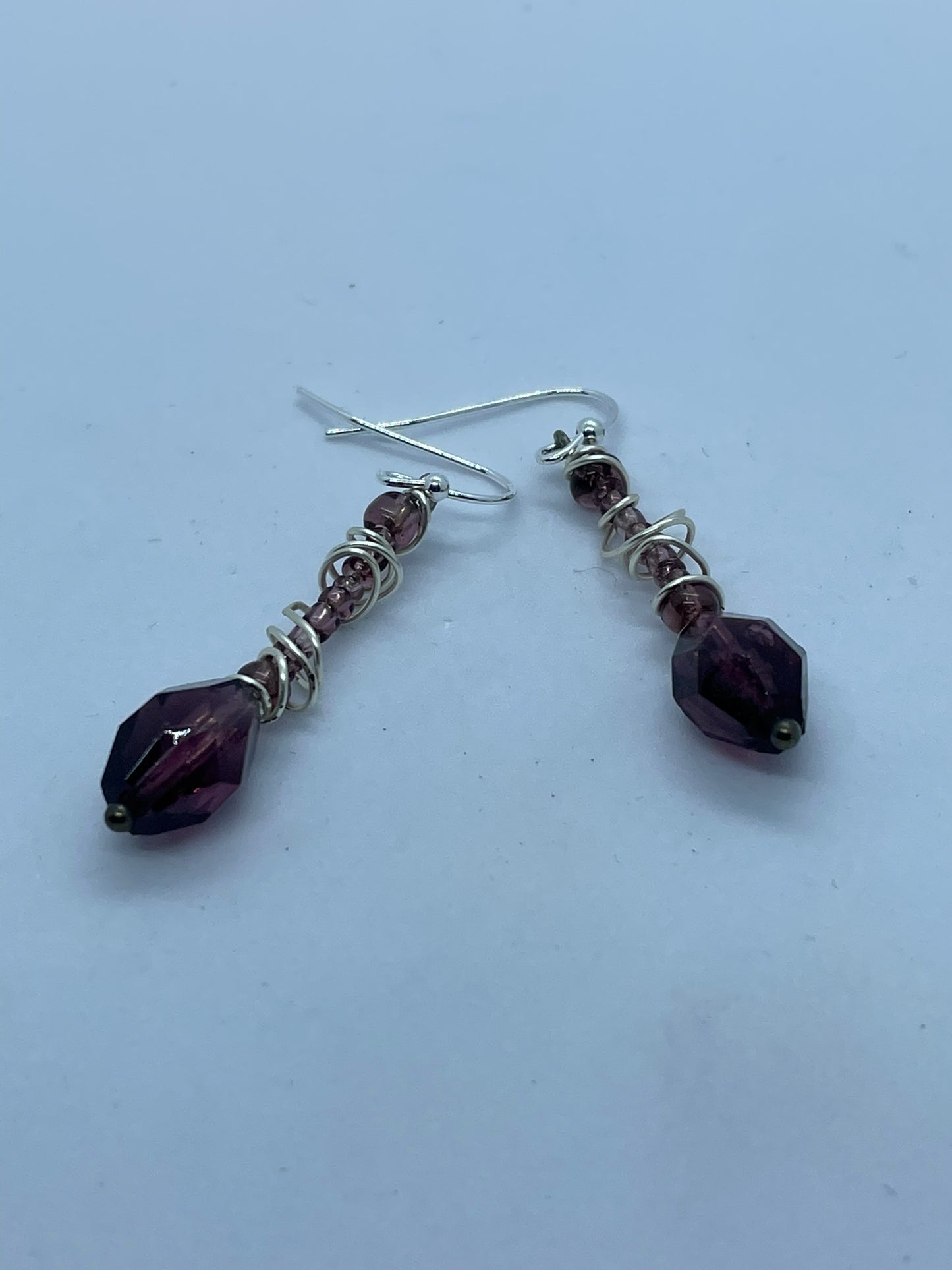 Wire & burgundy bead earrings with silver wire twist