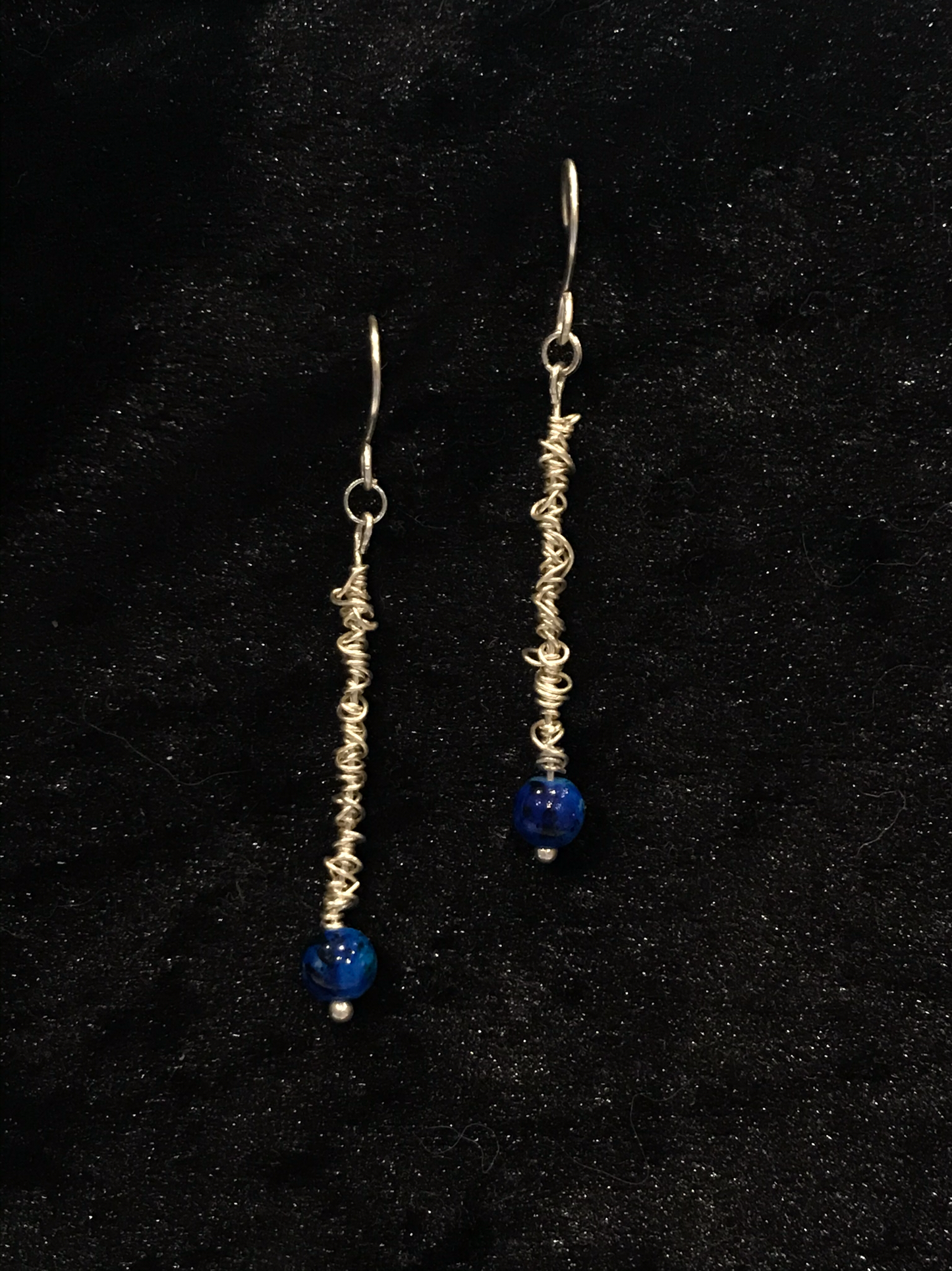 Wire & small blue bead earrings with silver twist detail