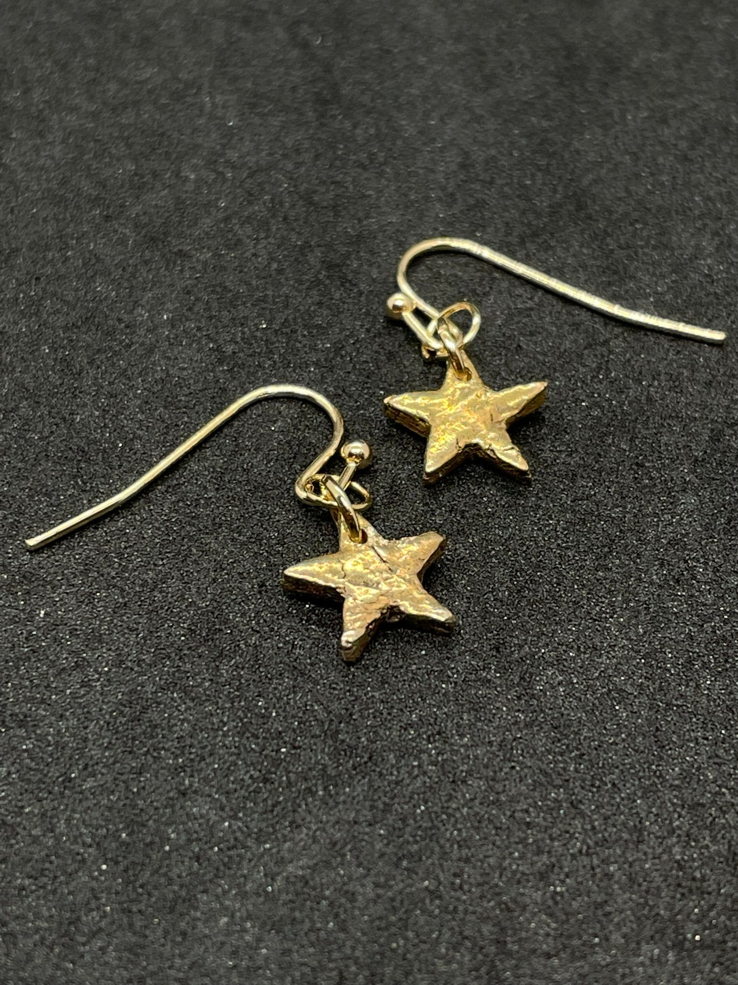 Bronze tiny star earrings