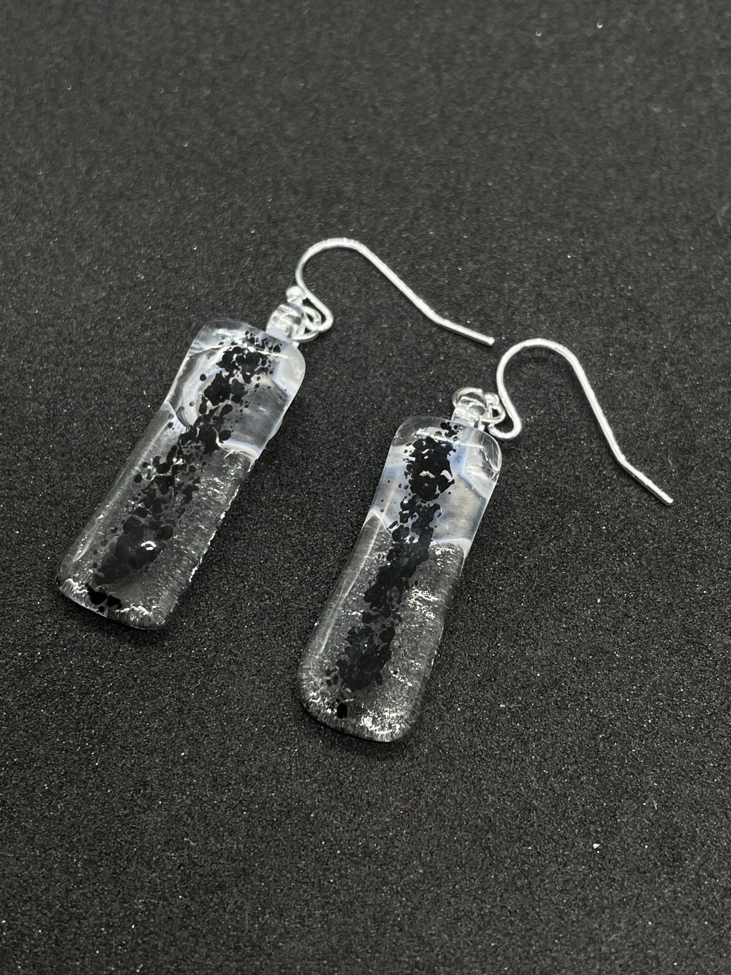 Fused clear and black glass oblong earrings