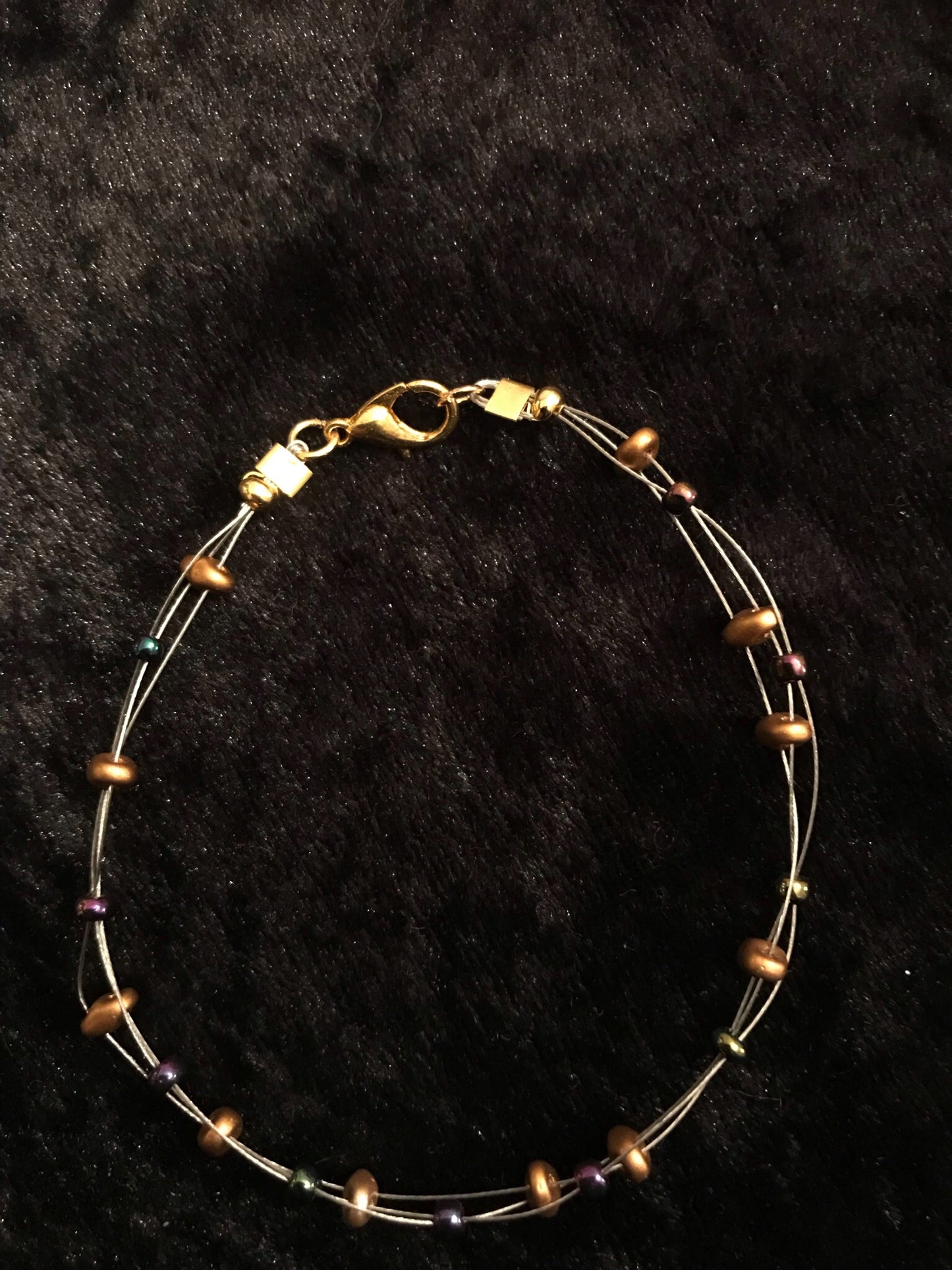 Wire with bronze seed bead bracelet