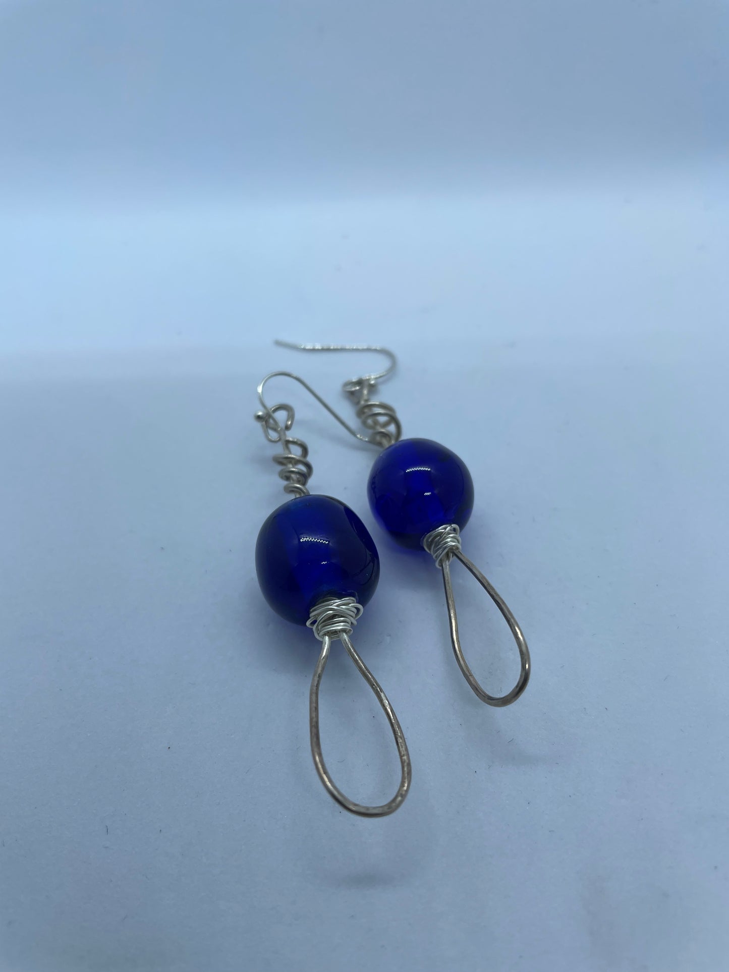 Wire & large blue bead earrings