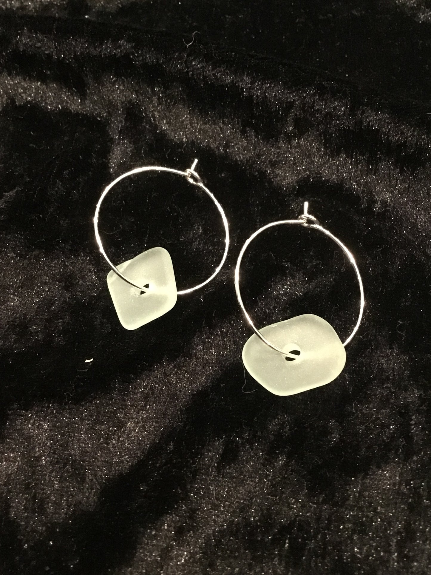 White single pieces of Seaglass earrings on hoop