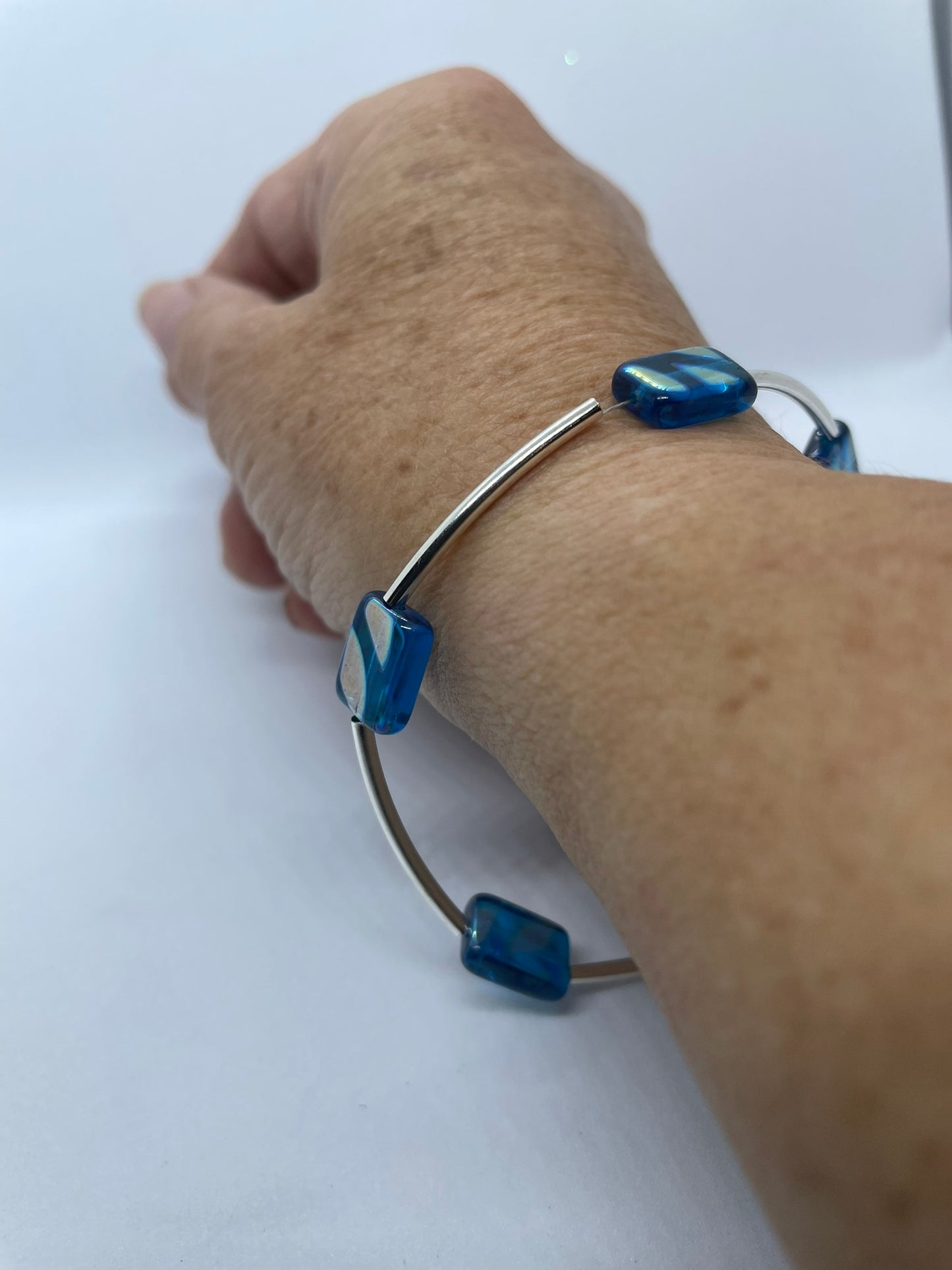 Wire & blue bead bracelet