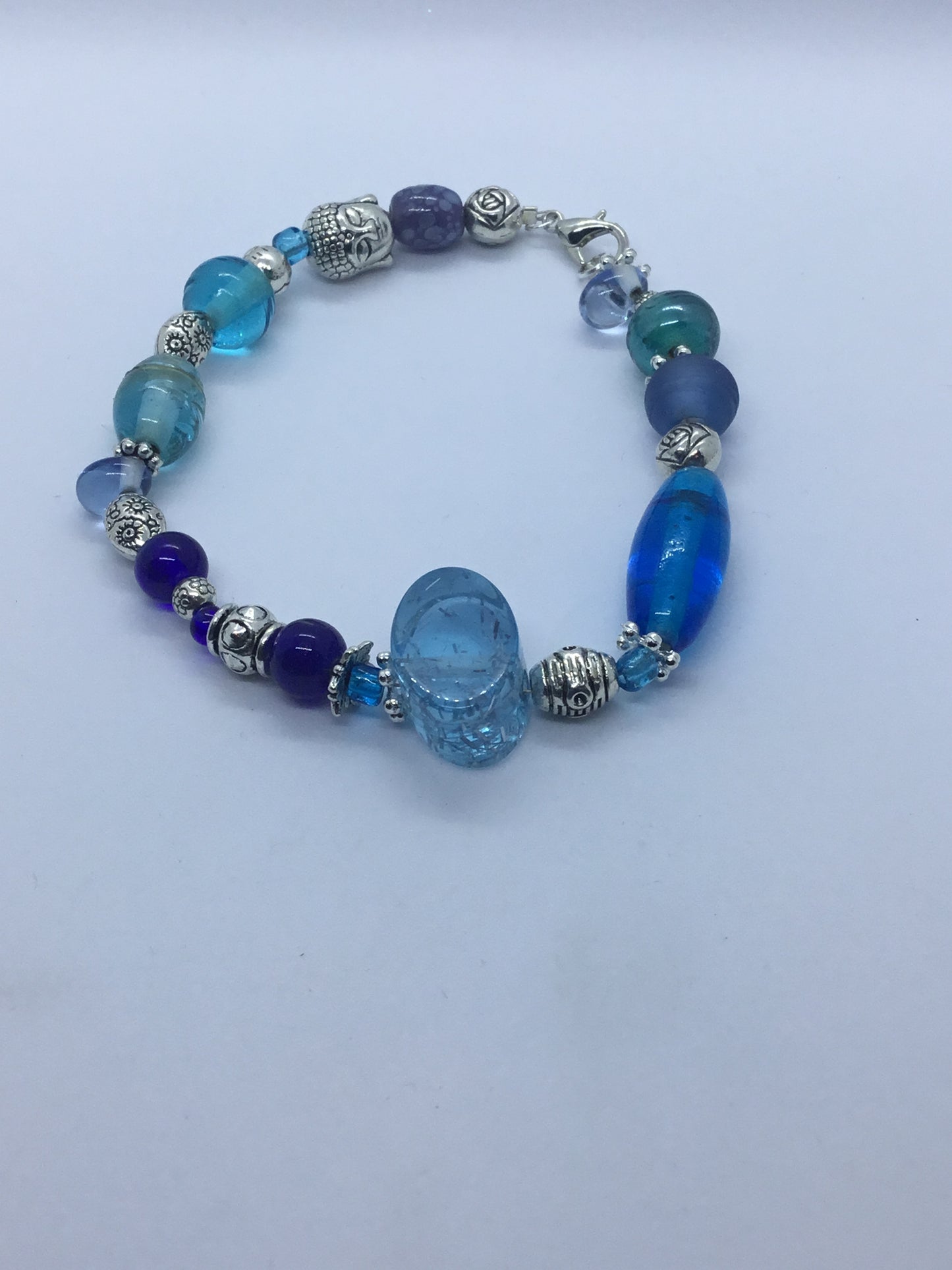Wire & blue bead with silver charm bracelet