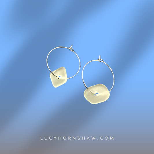 White single pieces of Seaglass earrings on hoop