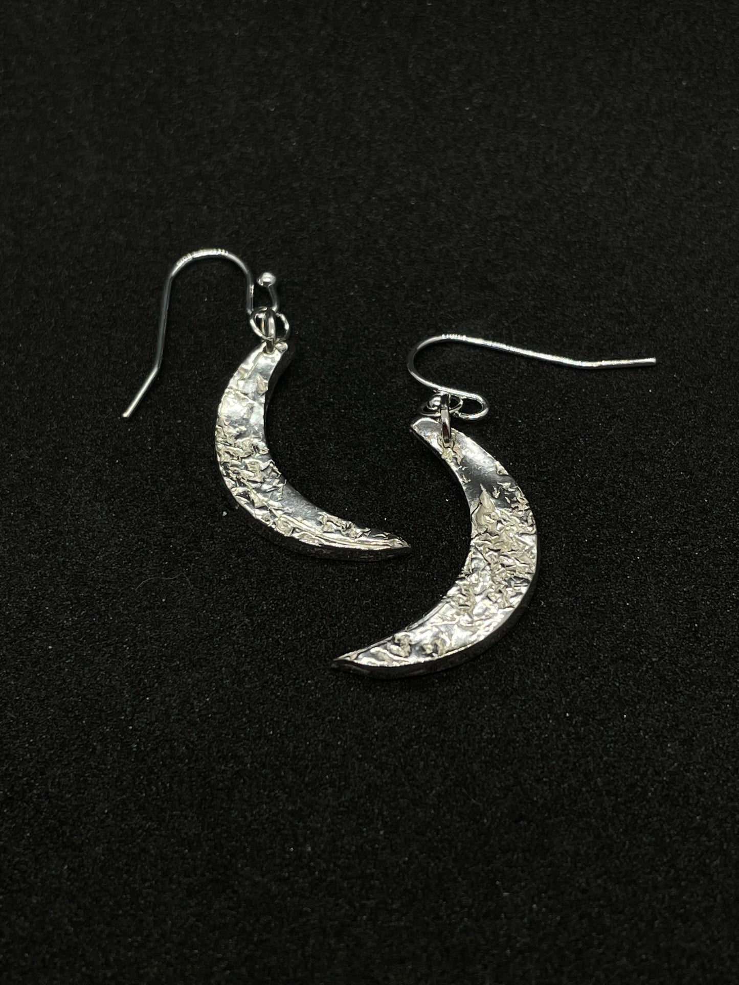 Silver crescent moon earrings