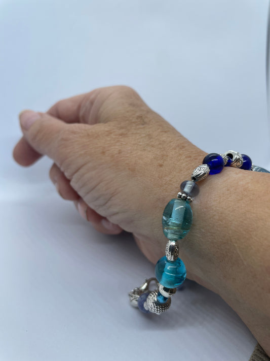 Wire & blue bead with silver charm bracelet
