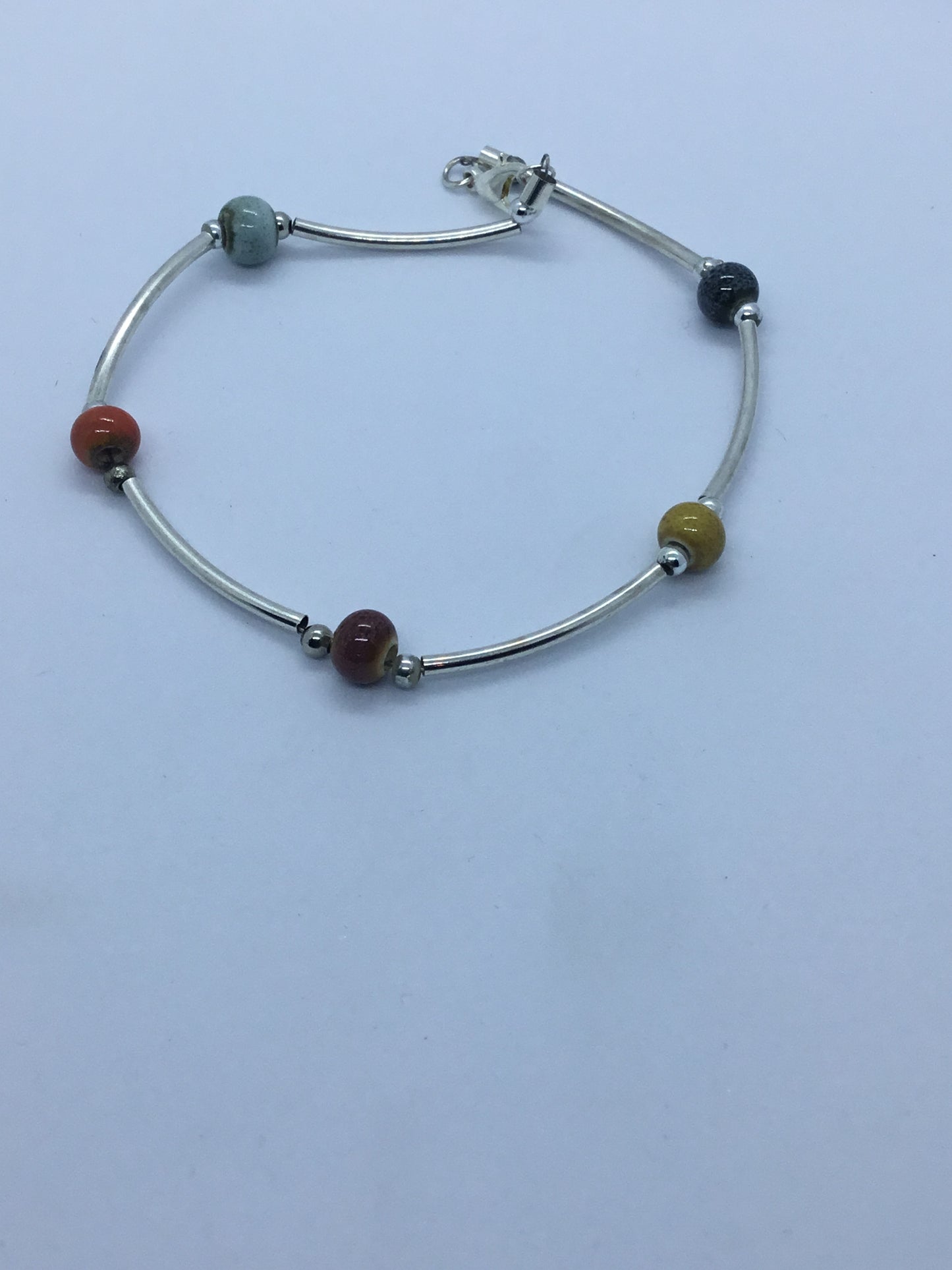 Wire & multi coloured bead bracelet