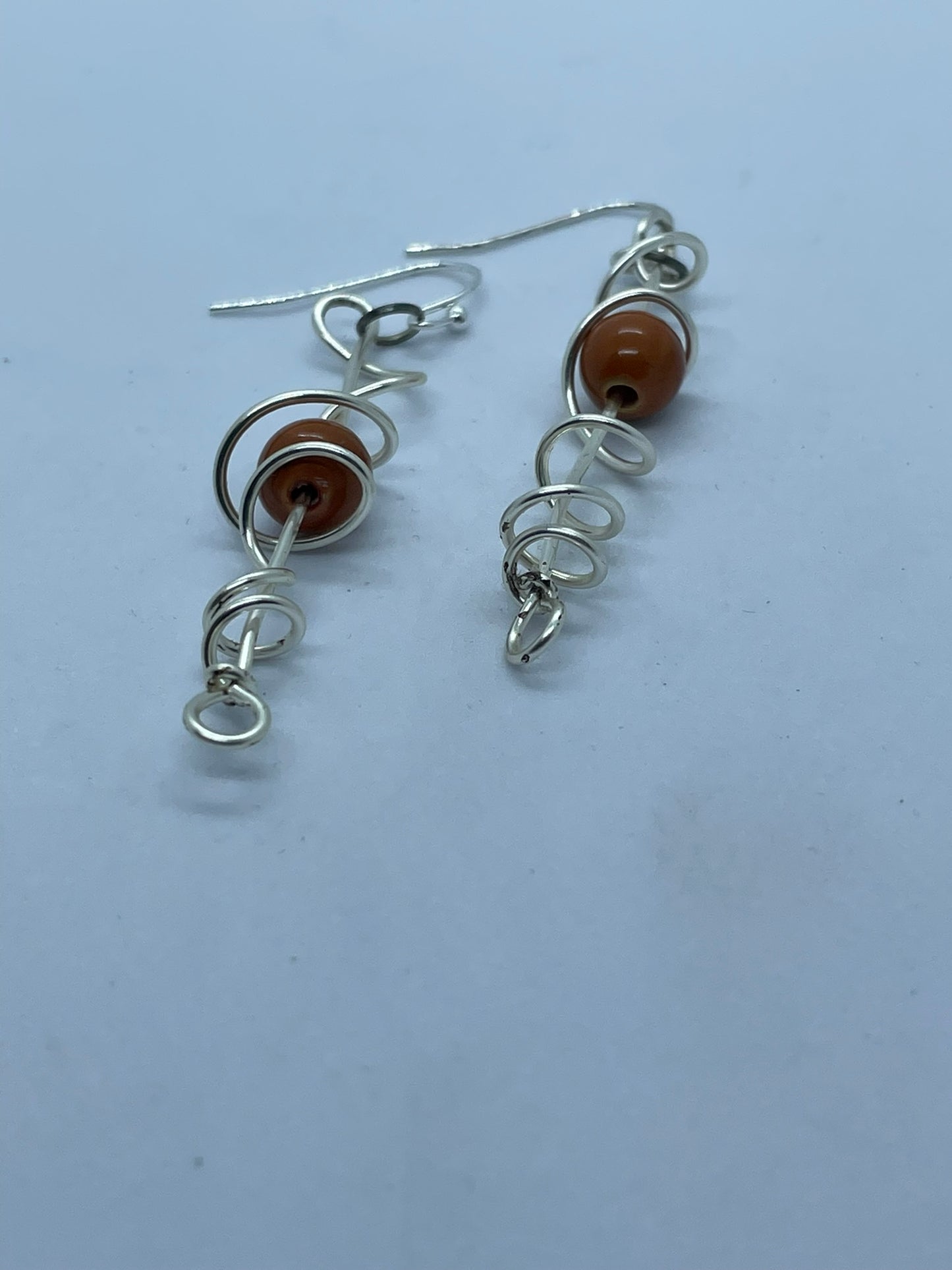 Wire & orange bead earrings