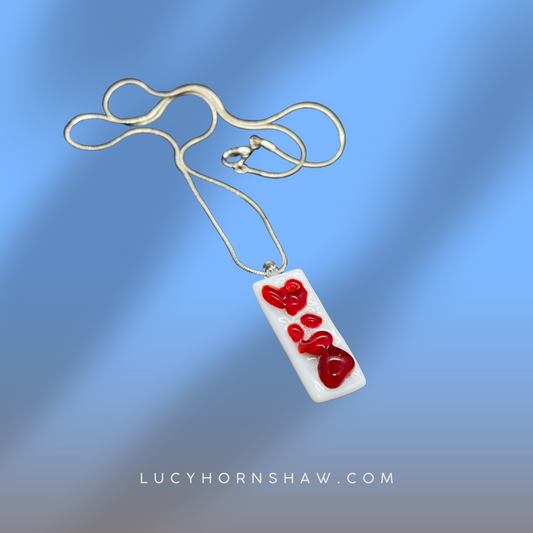 Fused red and white glass oblong necklace
